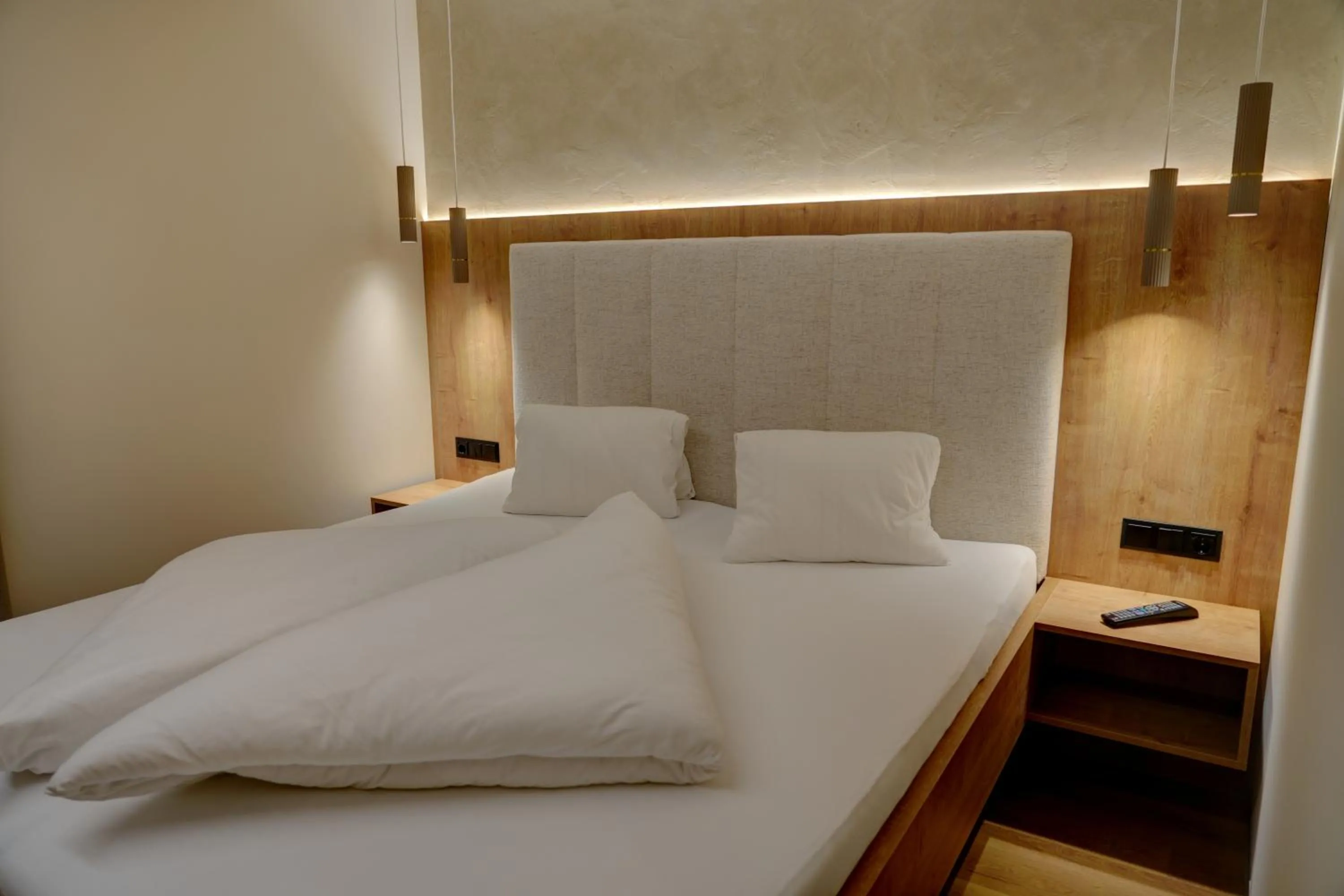 Bed in Aparthotel Iris