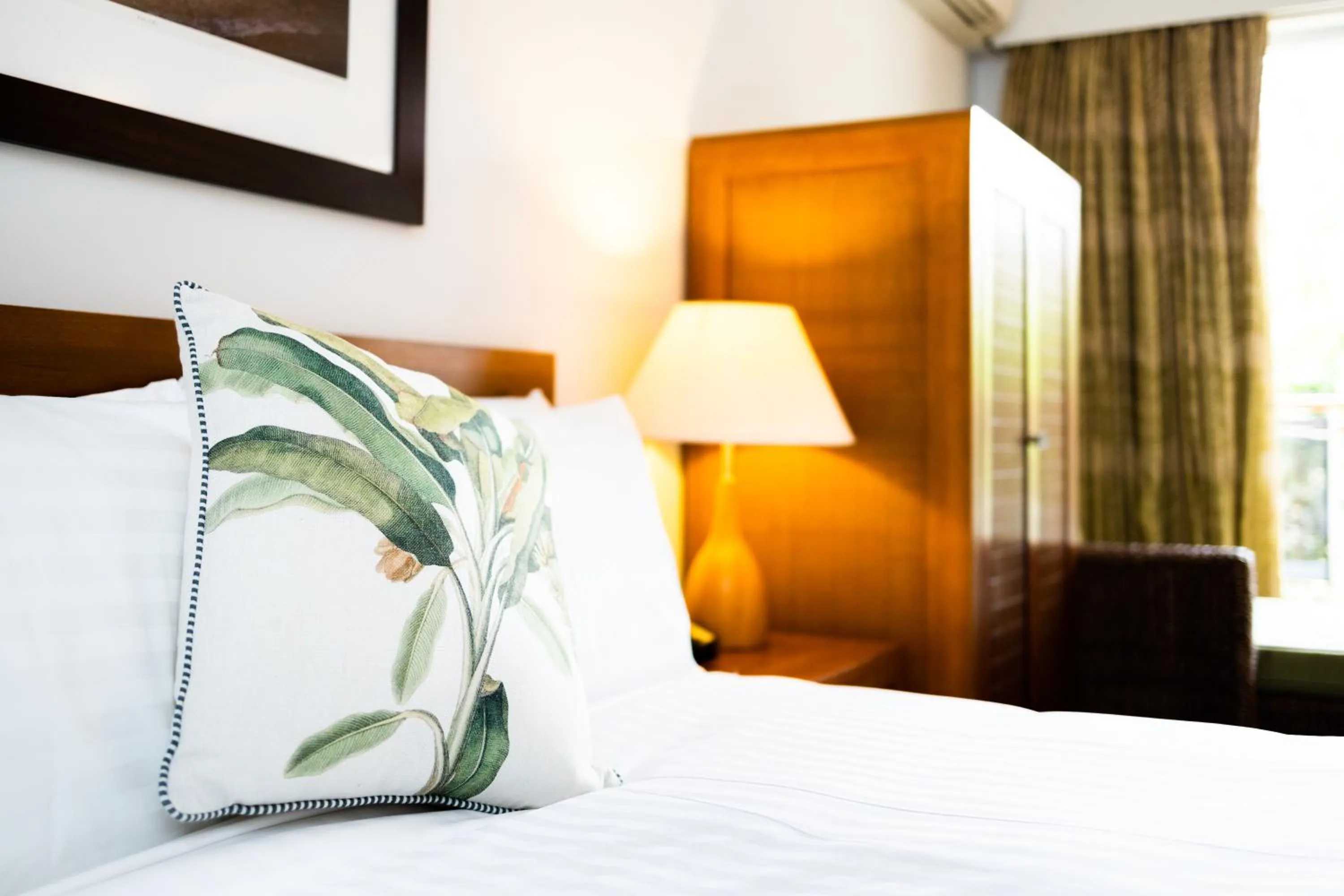 Bed in The Continental Hotel