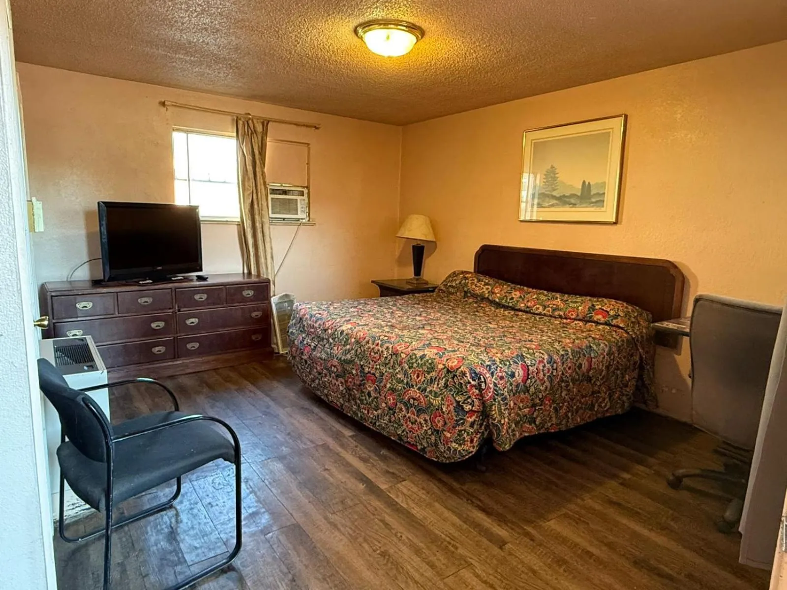 Bedroom, Bed in Springs Inn by Capital O I 25