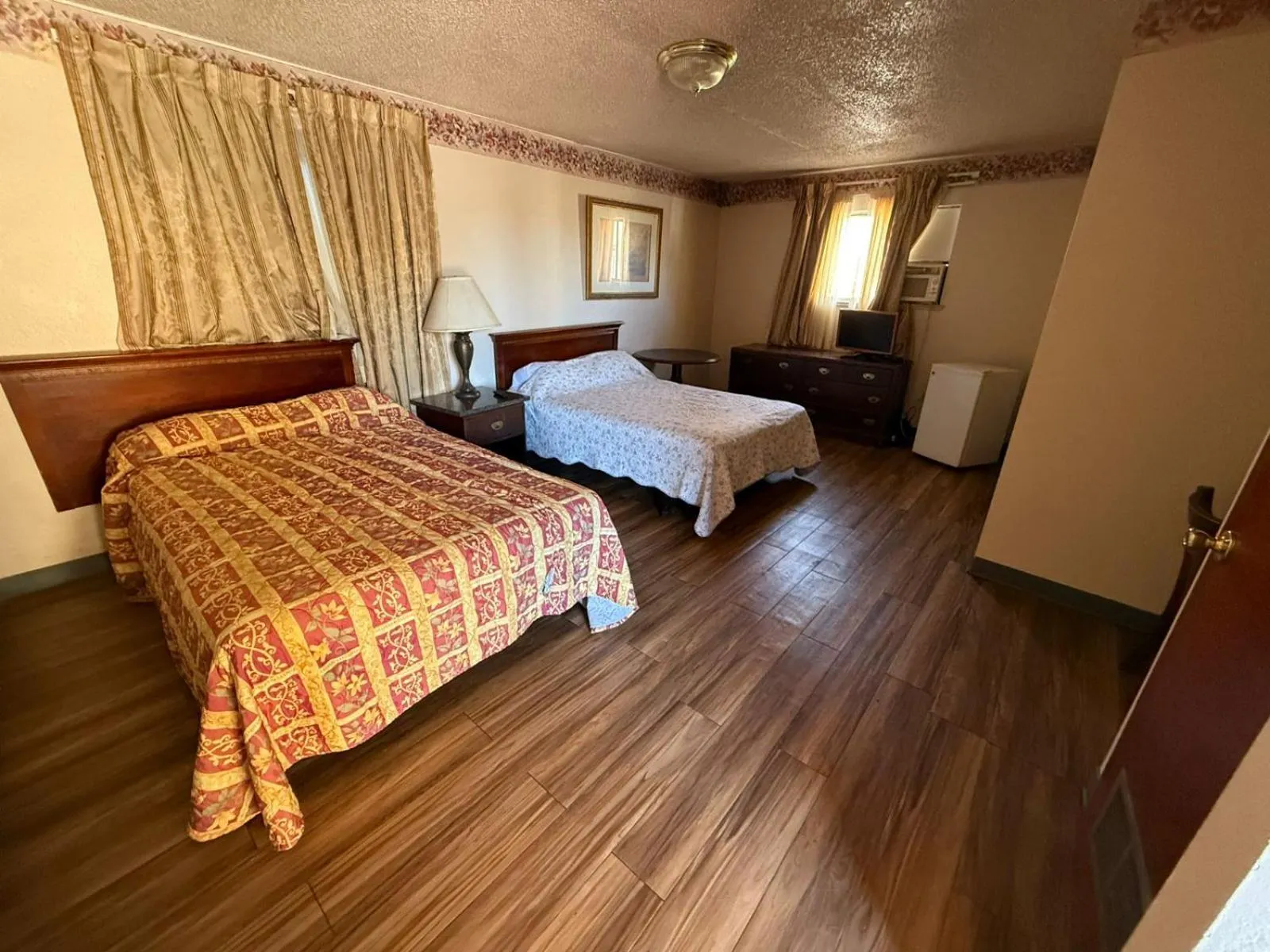 Bedroom, Bed in Springs Inn by Capital O I 25