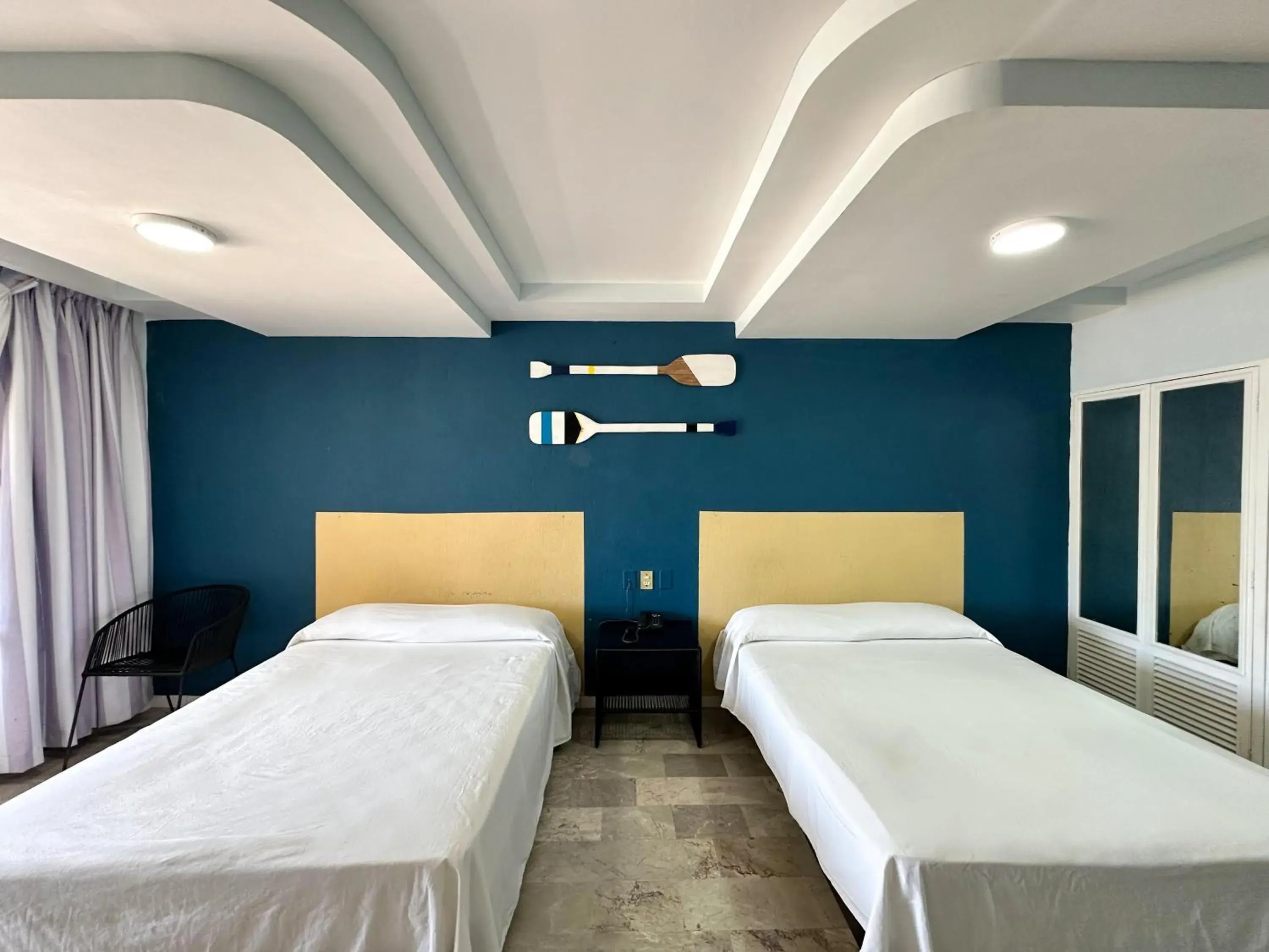 Bed in Acamar Beach Resort Bed in Acamar Beach Resort