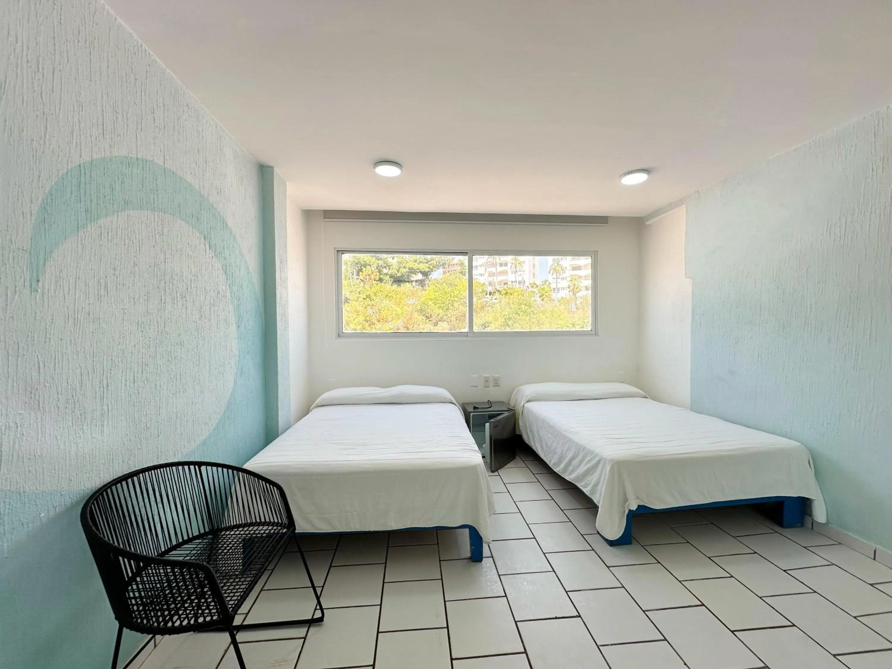 Bed in Acamar Beach Resort