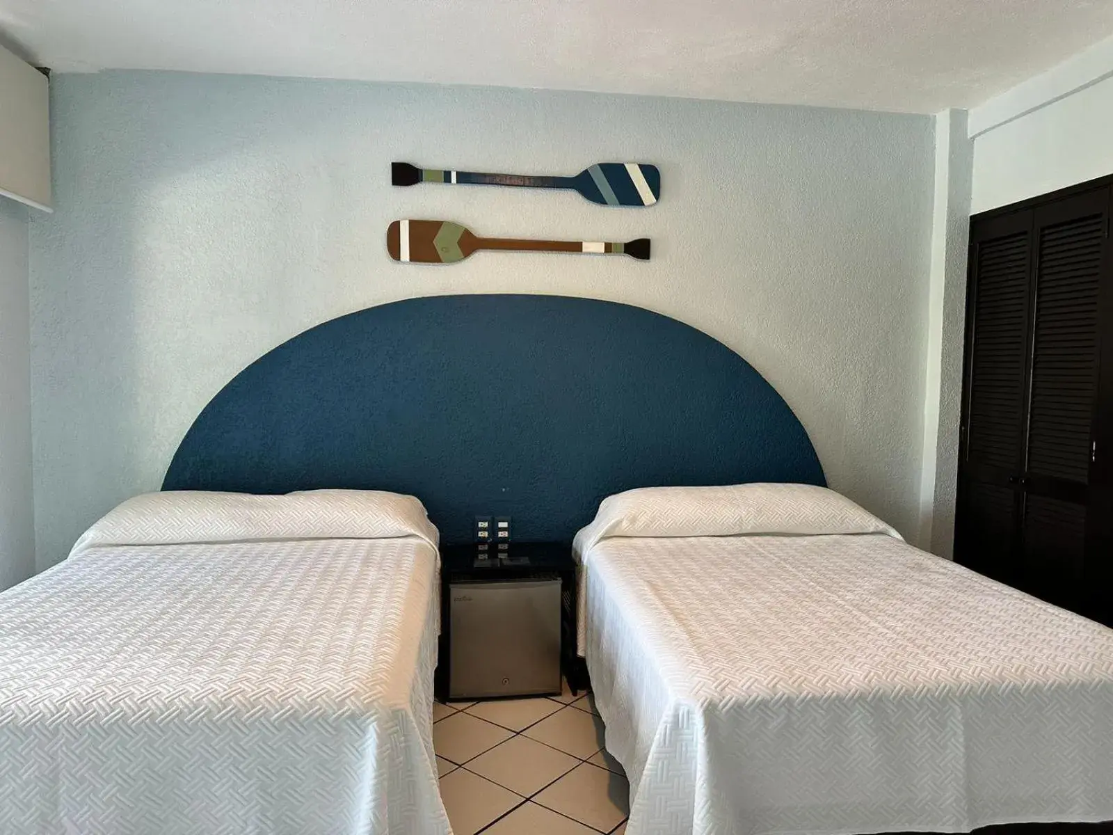 Bed in Acamar Beach Resort Bed in Acamar Beach Resort