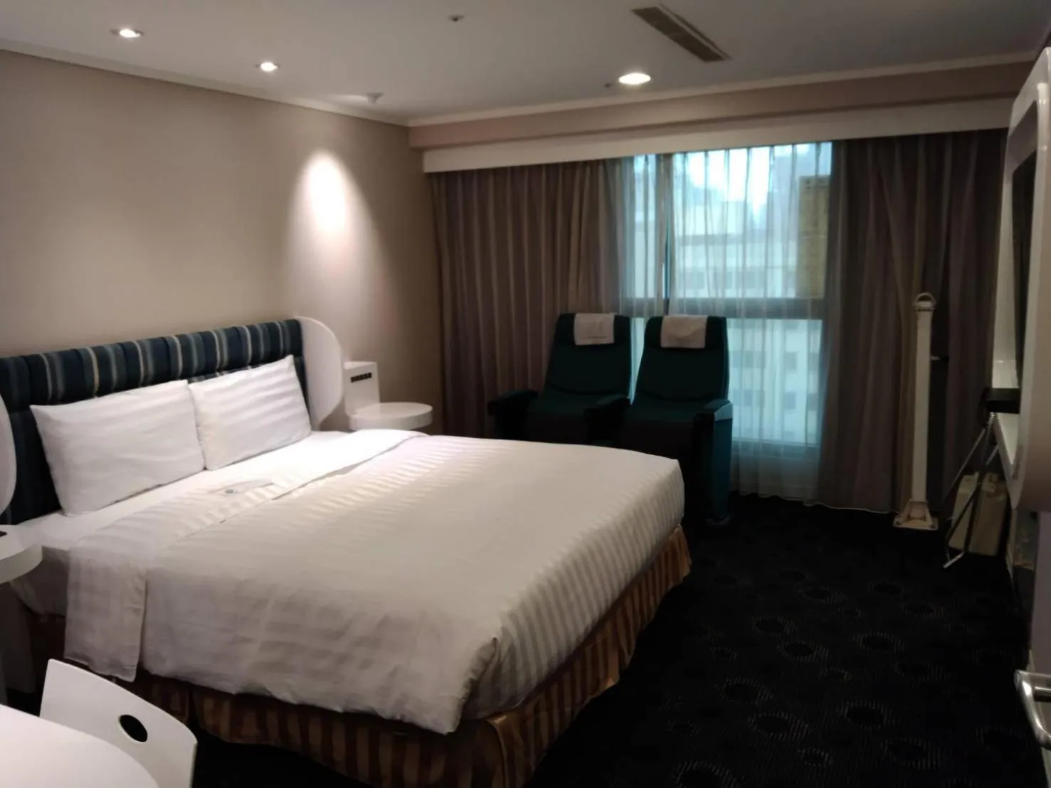 Bed in Ximen Airline Hotel
