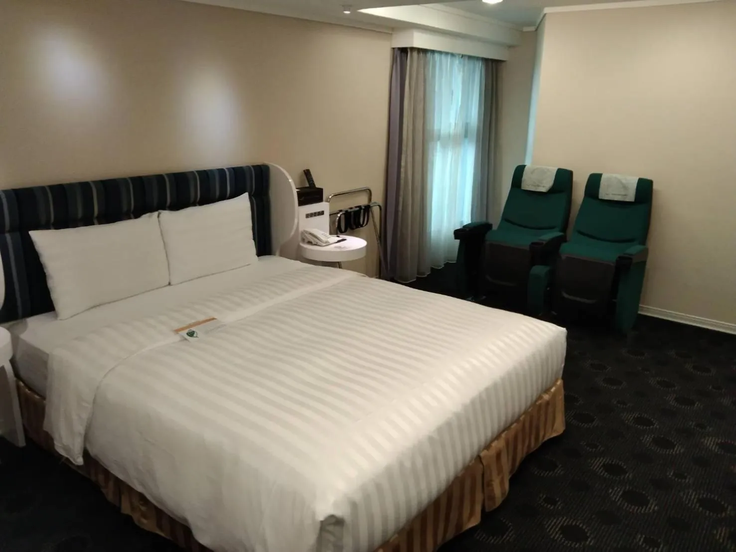 Bed in Ximen Airline Hotel
