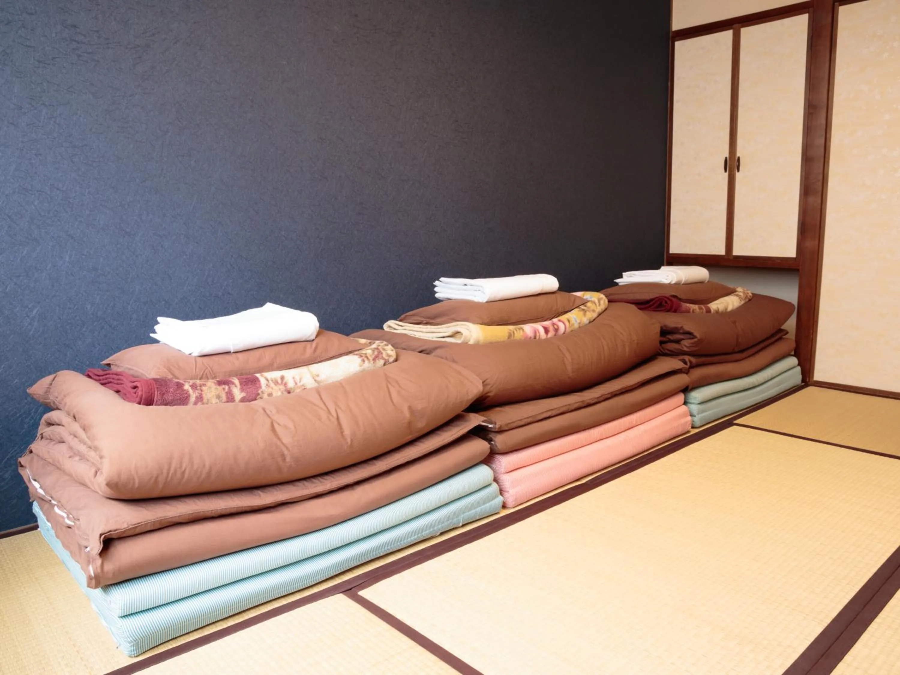 Photo of the whole room, Bed in J-Hoppers Hiroshima Guesthouse