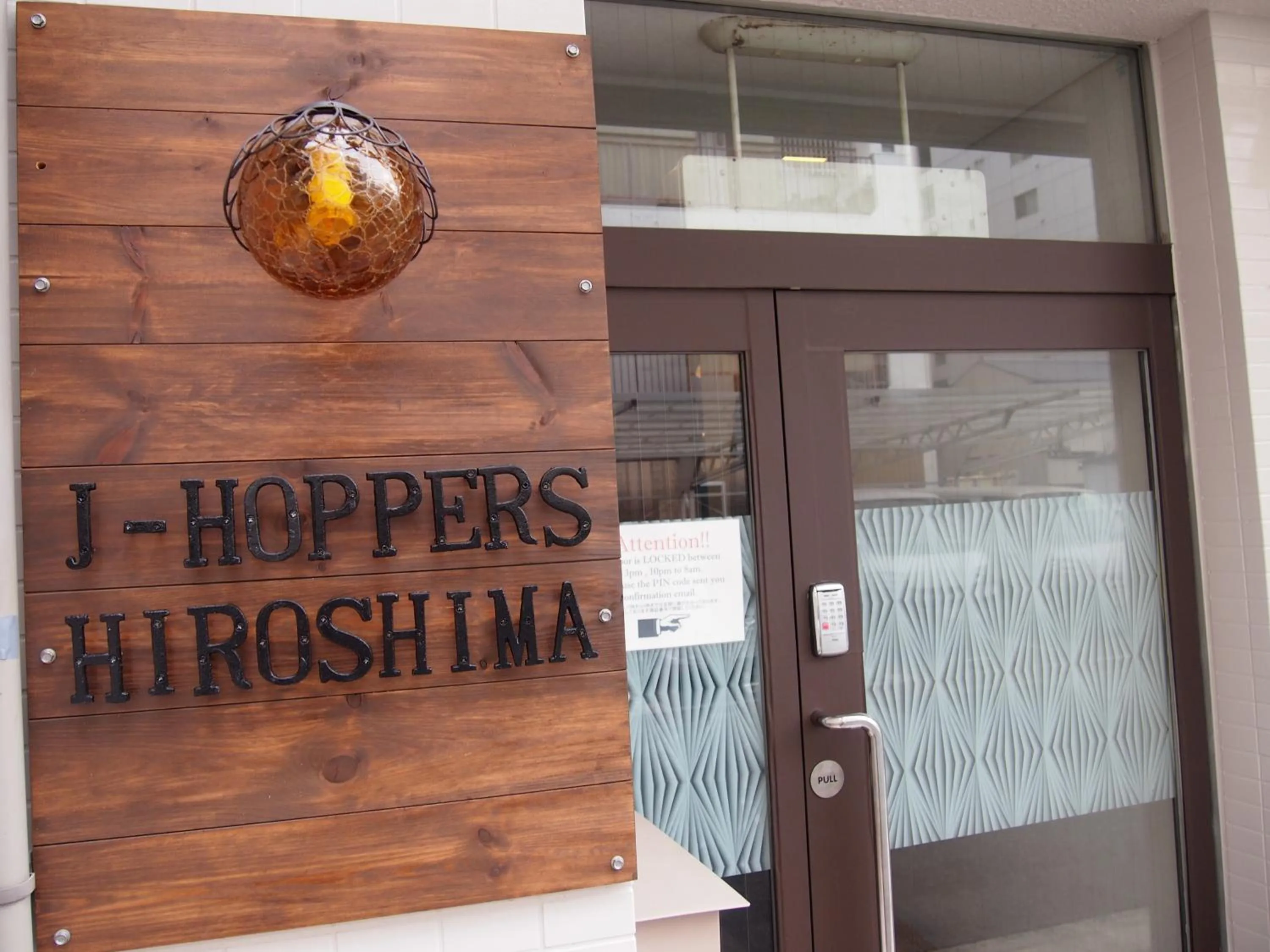 Facade/entrance in J-Hoppers Hiroshima Guesthouse