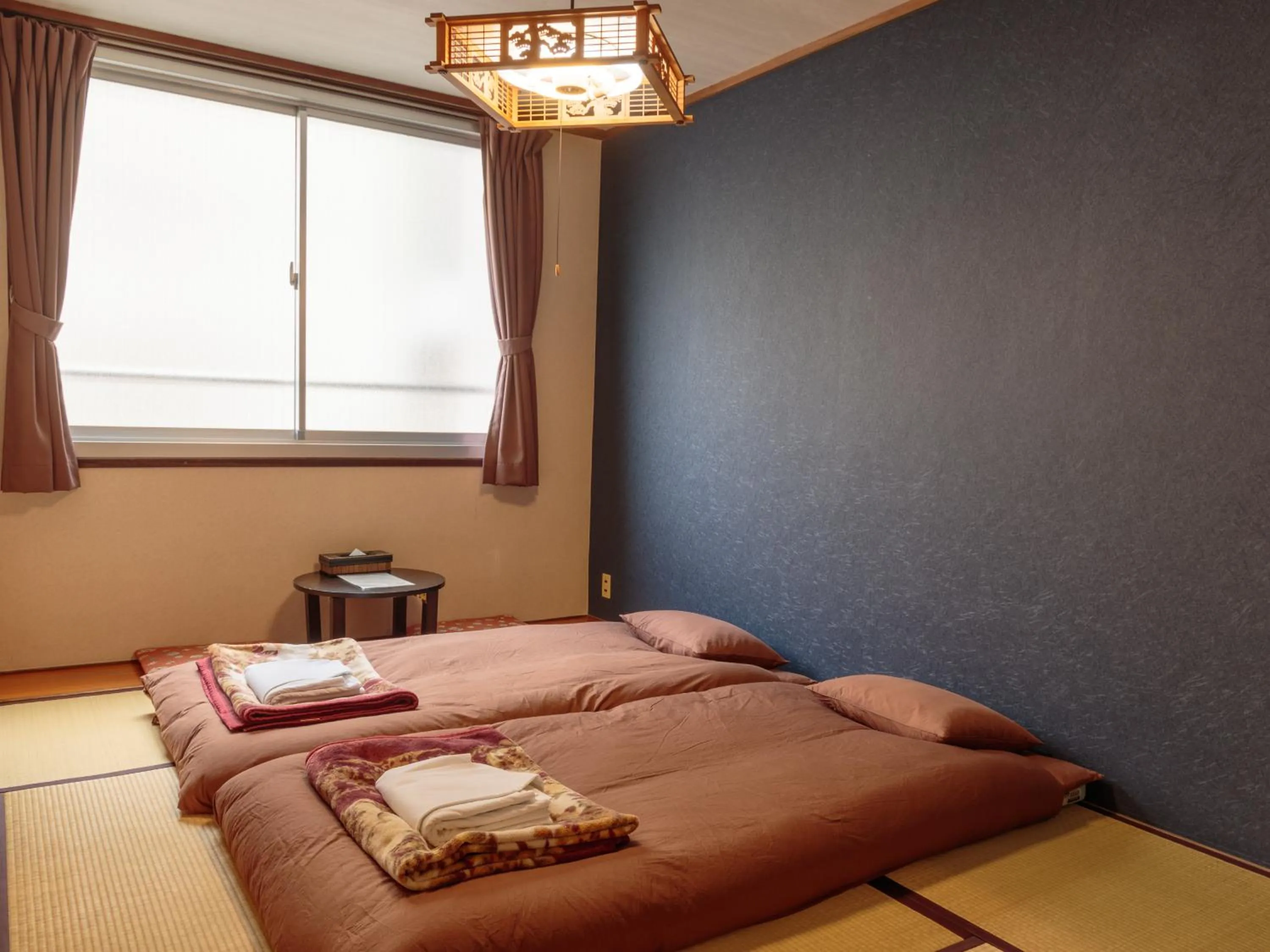 Photo of the whole room, Bed in J-Hoppers Hiroshima Guesthouse
