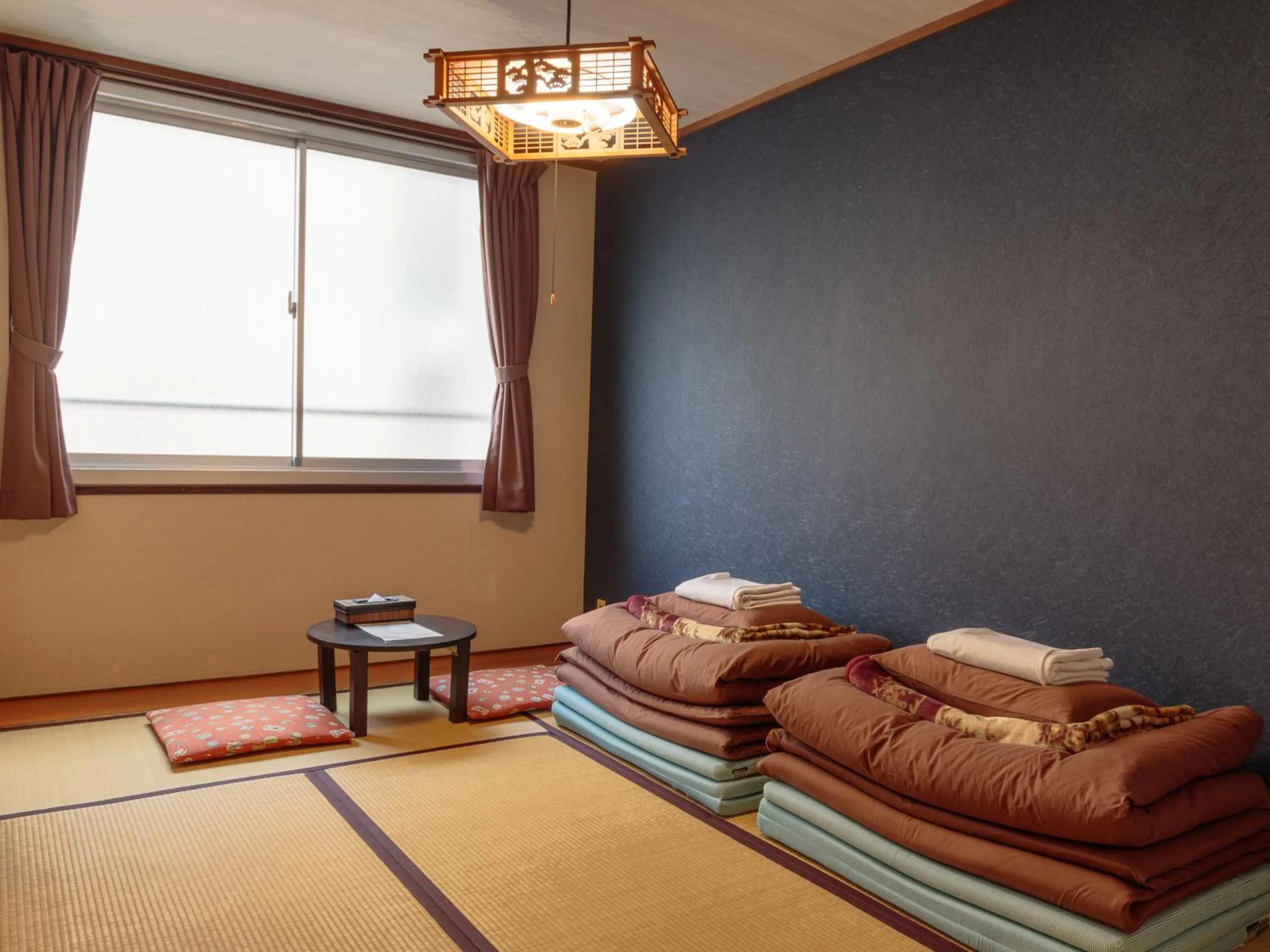 Photo of the whole room, Bed in J-Hoppers Hiroshima Guesthouse