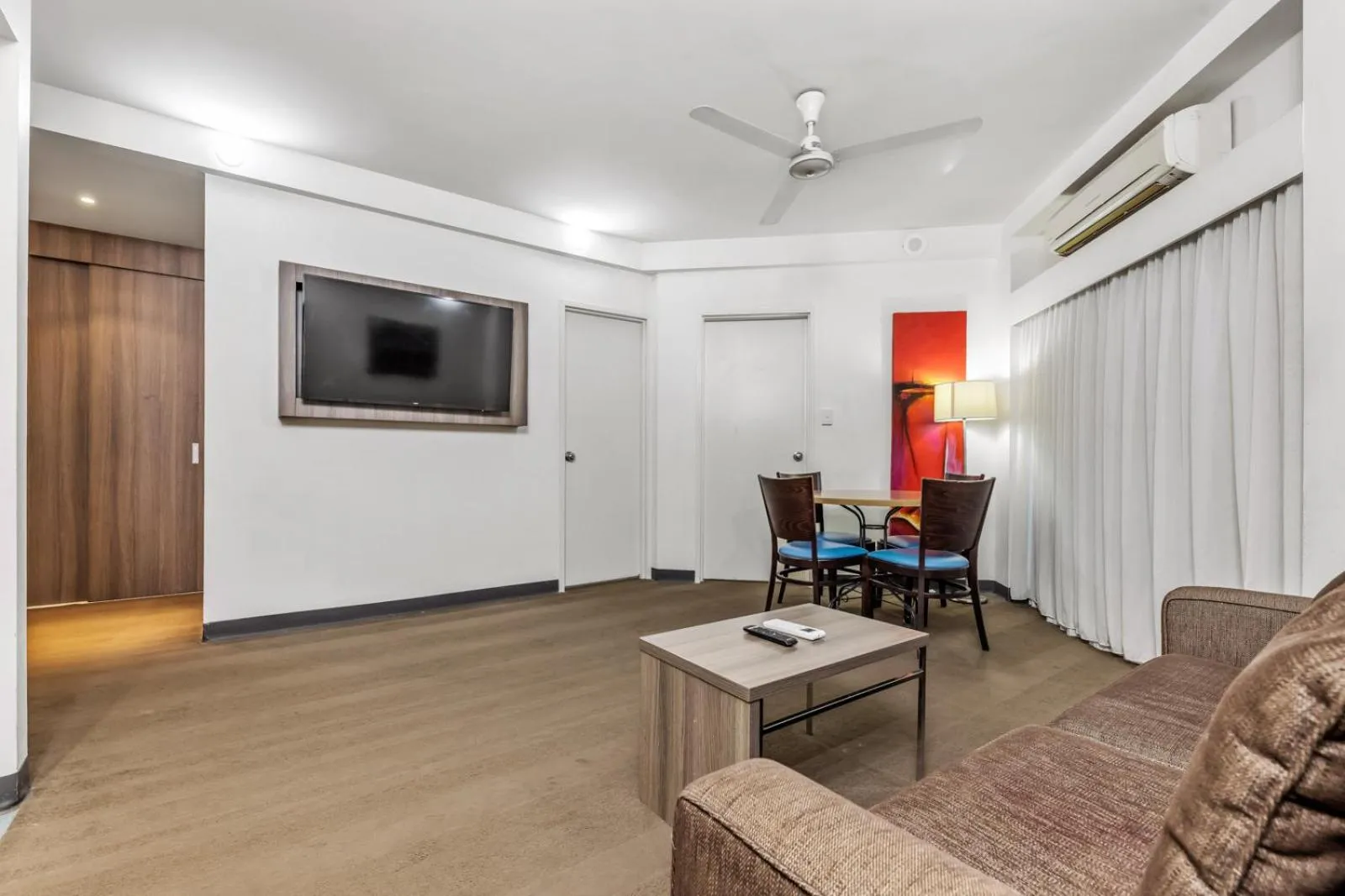 Communal lounge/ TV room in Novotel Darwin CBD