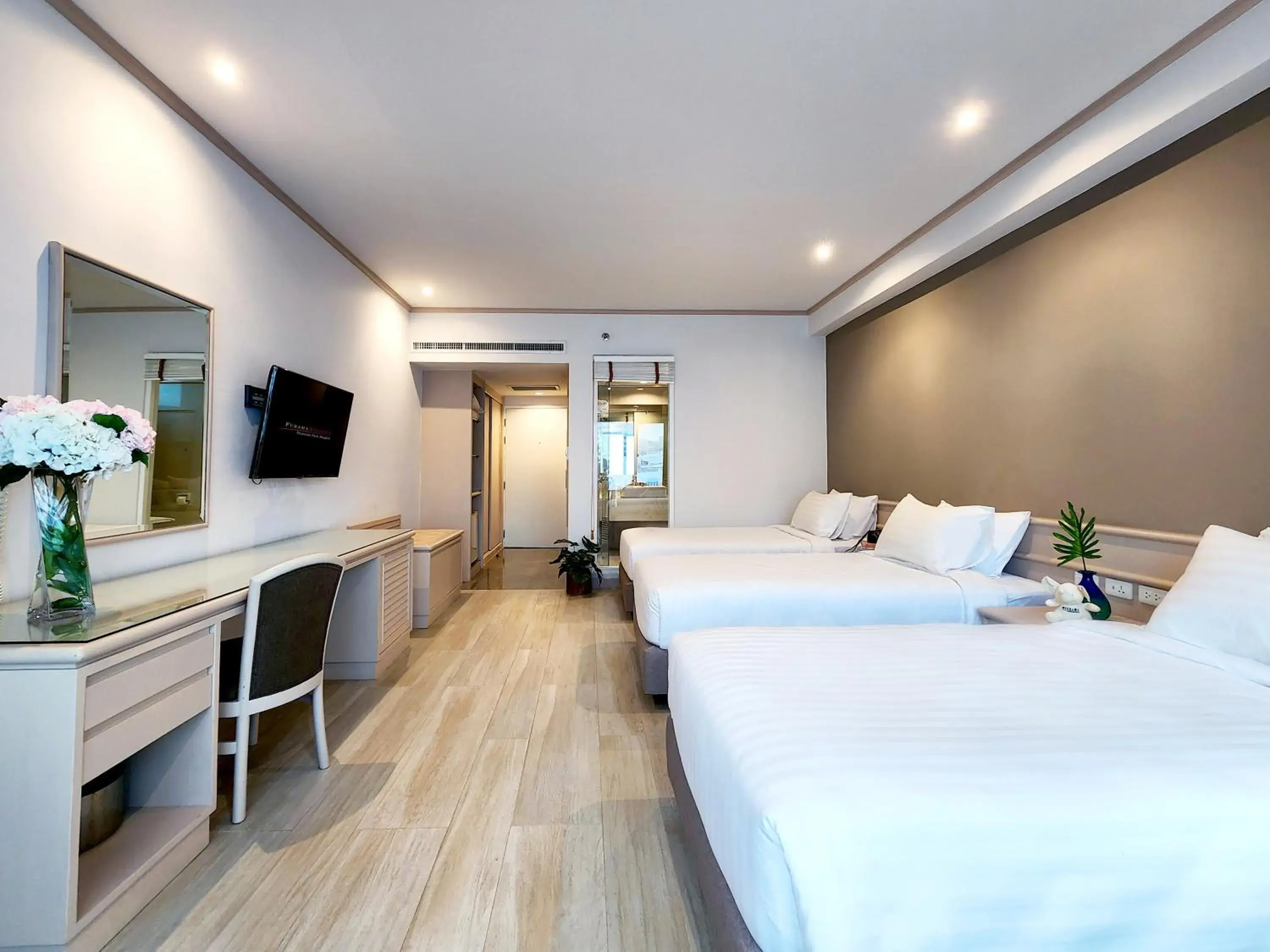 Bed in FuramaXclusive Pratunam Park Hotel Bed in FuramaXclusive Pratunam Park Hotel