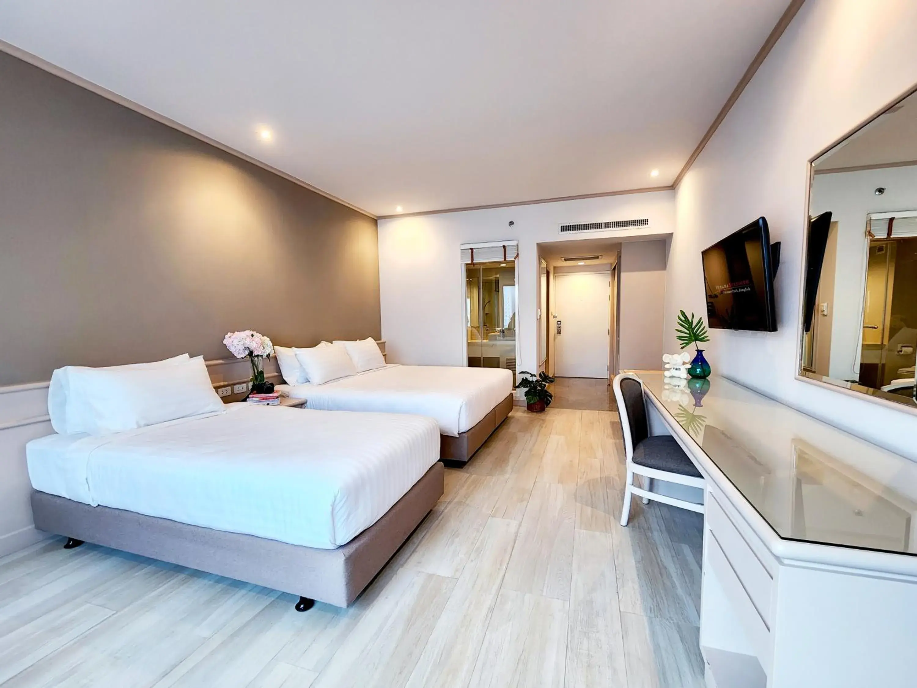 Bed in FuramaXclusive Pratunam Park Hotel Bed in FuramaXclusive Pratunam Park Hotel