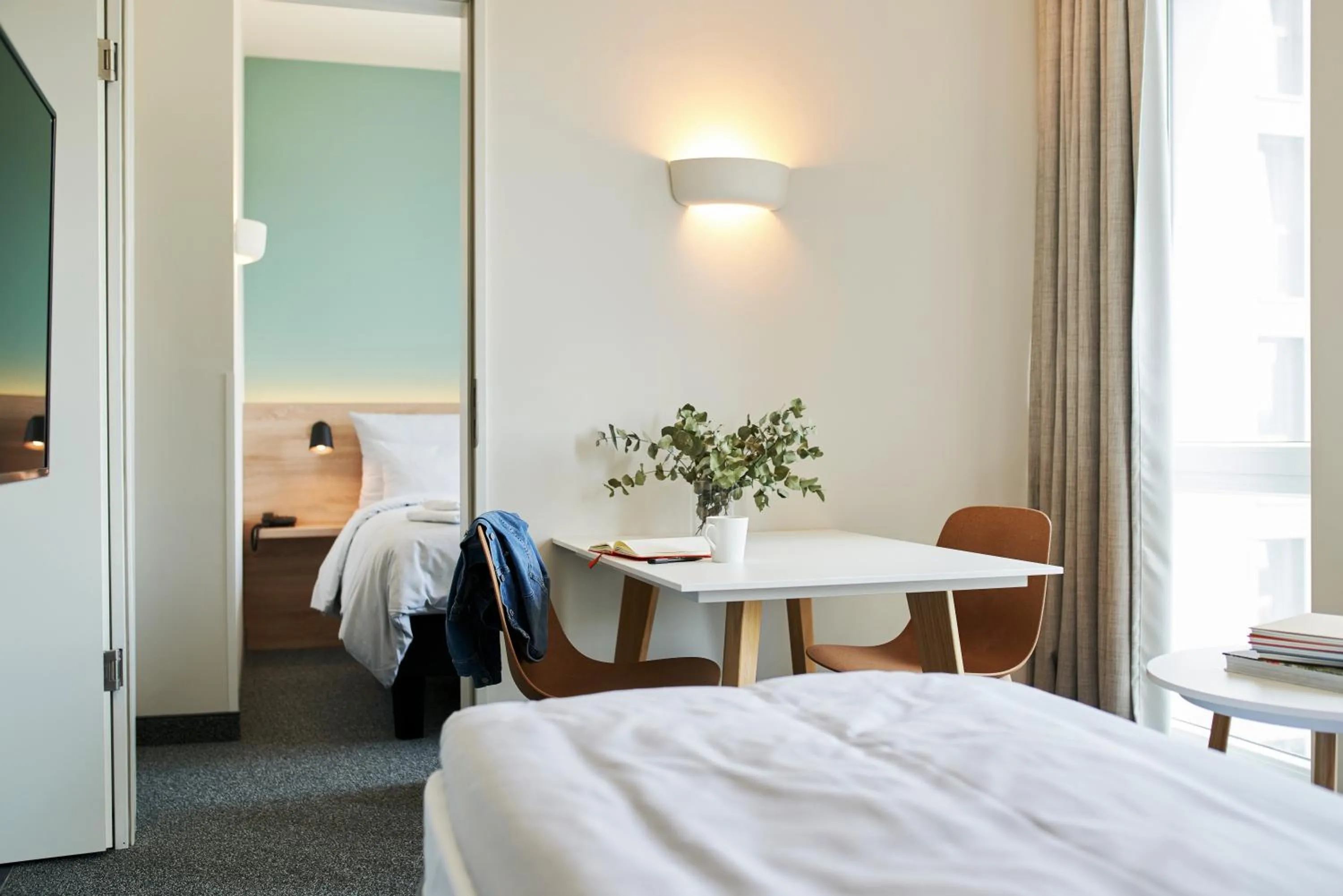 Dining area, Bed in sylc. Apartmenthotel – Serviced Apartments