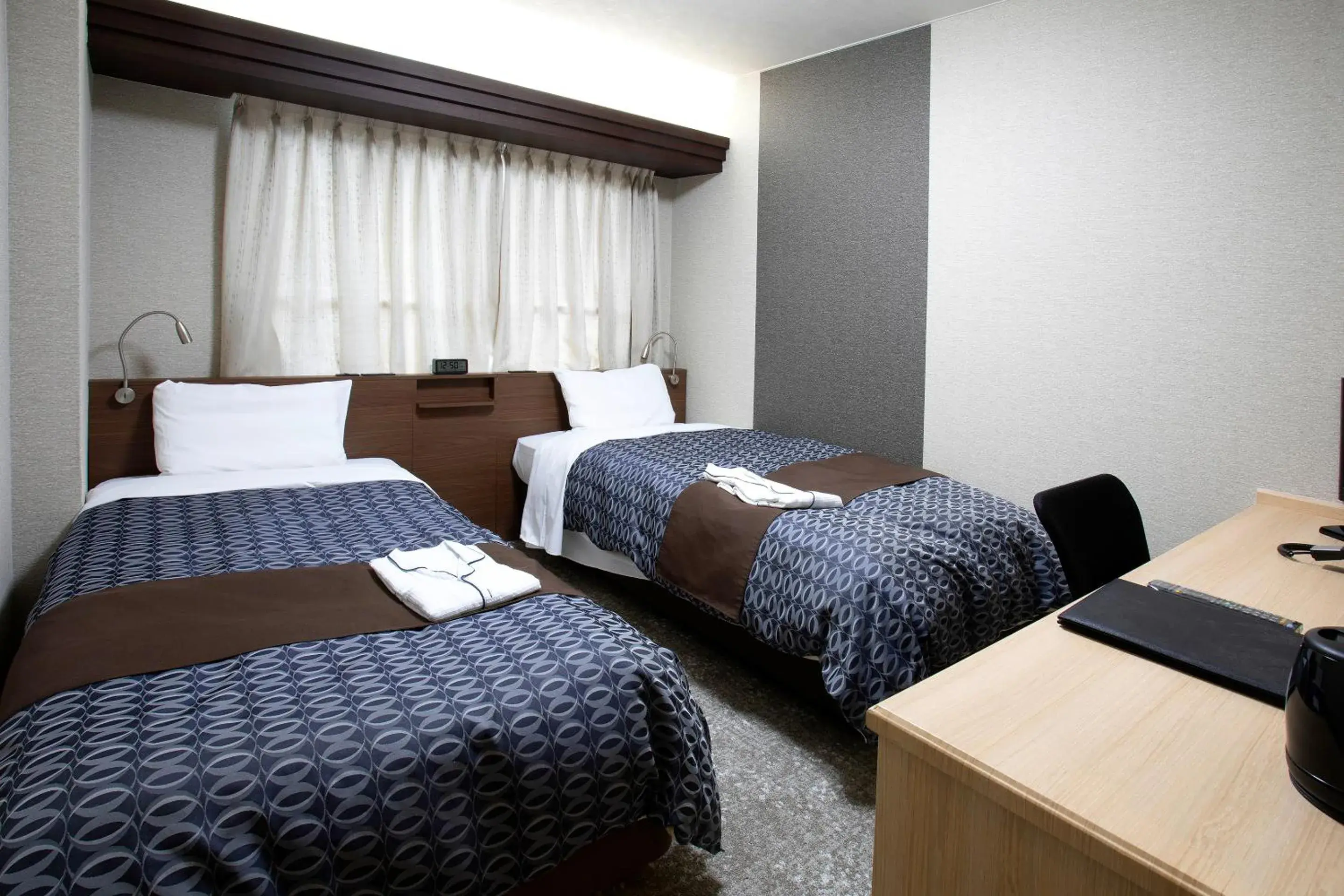 Bed in Nagasaki IK Hotel Bed in Nagasaki IK Hotel