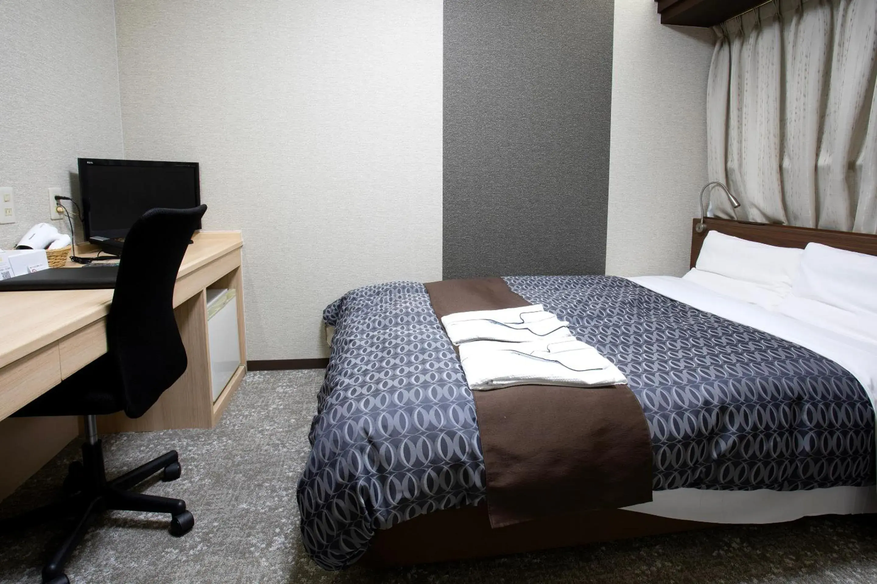 Bed in Nagasaki IK Hotel Bed in Nagasaki IK Hotel