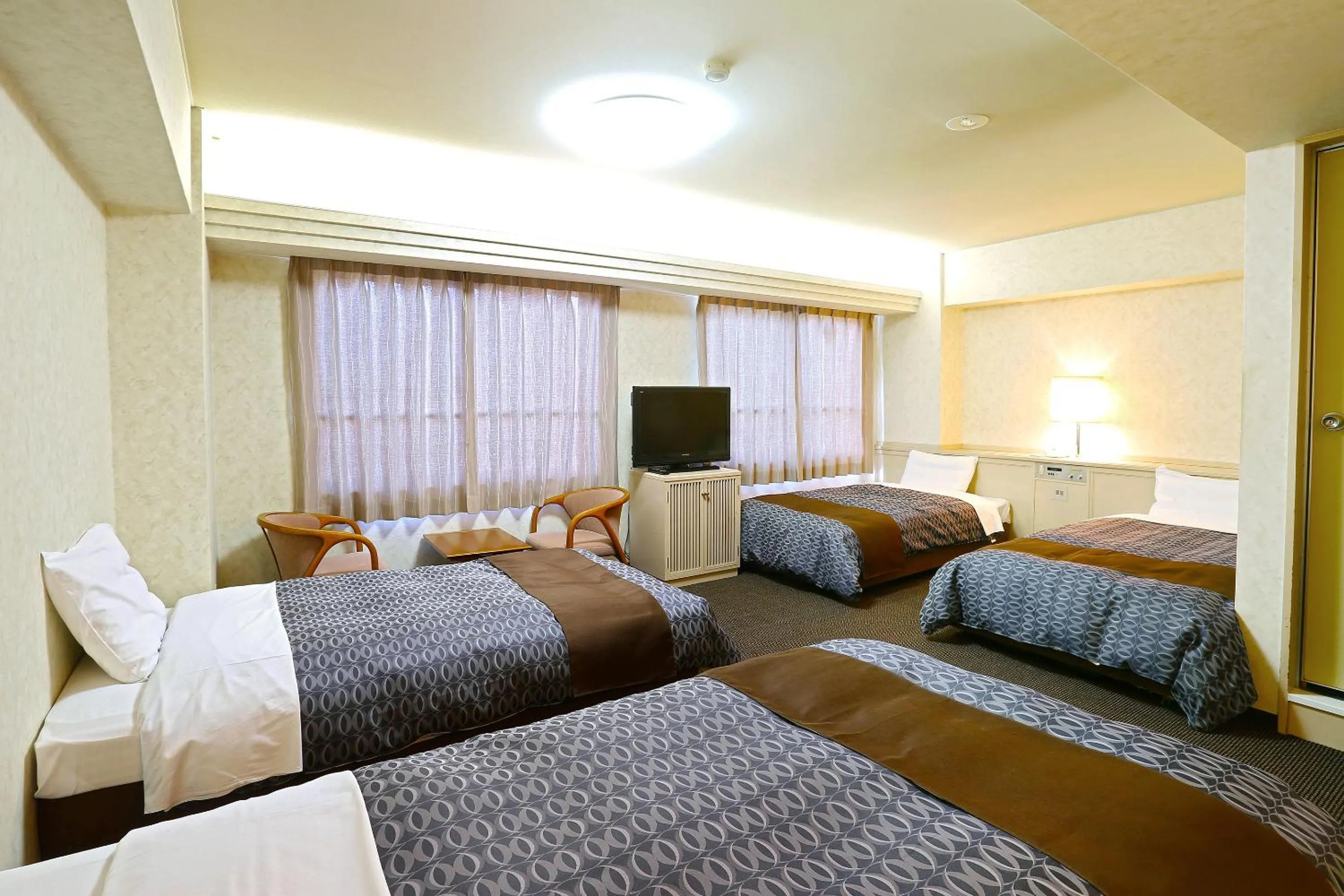 Bed in Nagasaki IK Hotel