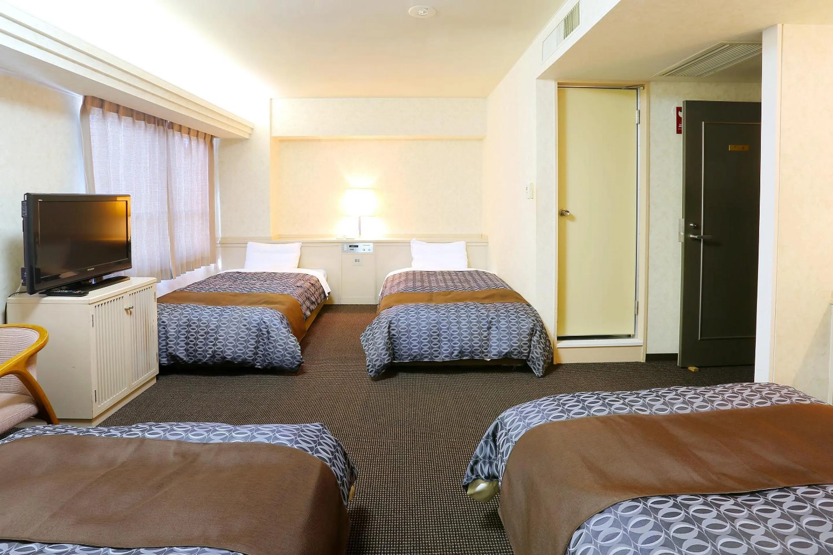 Bed in Nagasaki IK Hotel