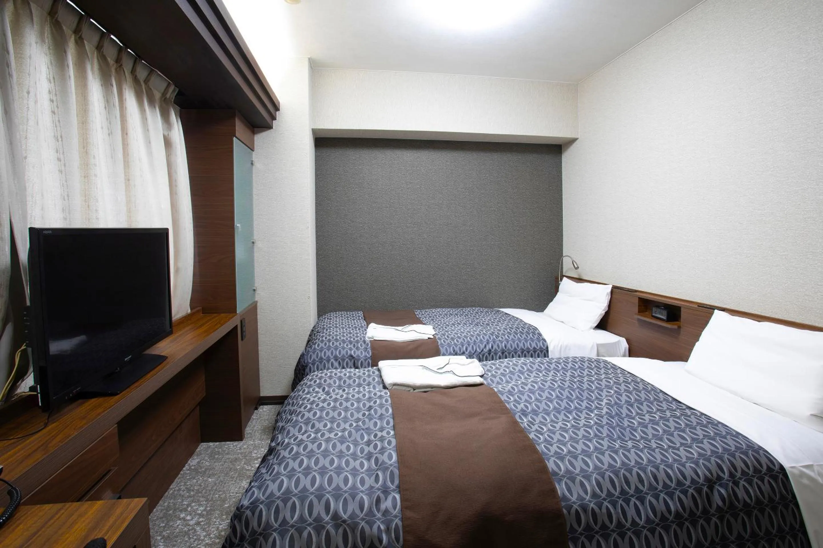 Bed in Nagasaki IK Hotel