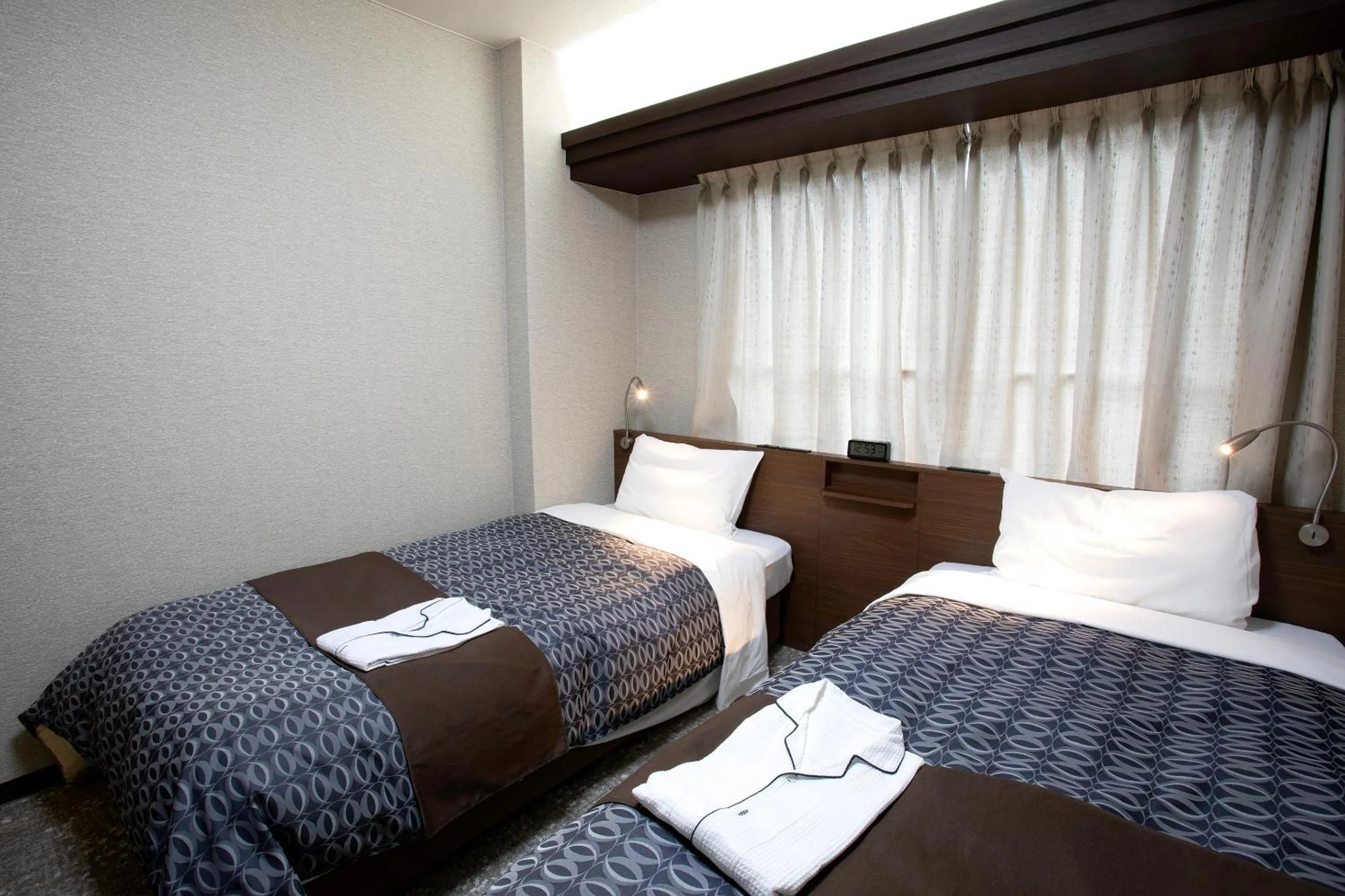 Bed in Nagasaki IK Hotel