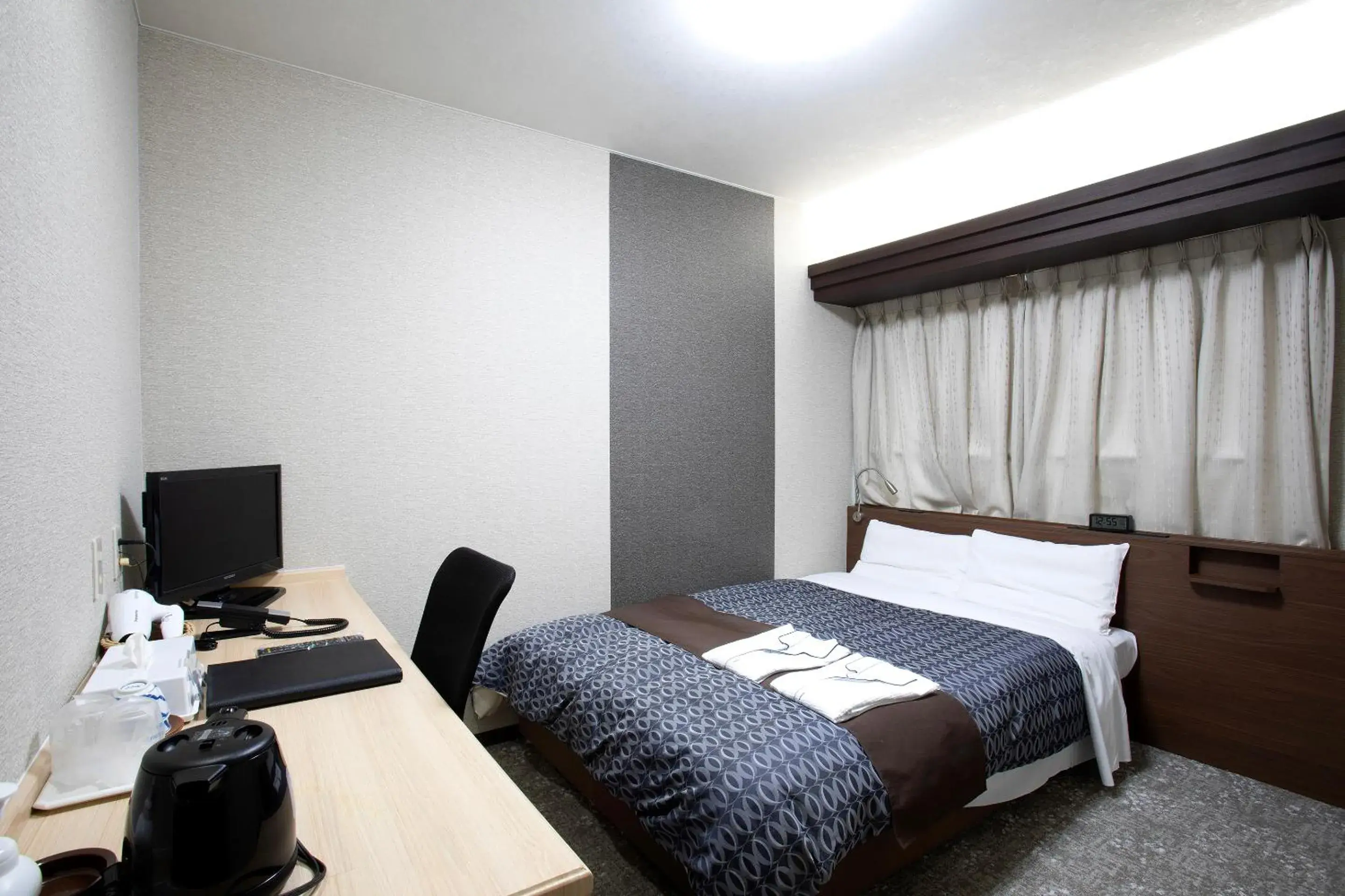 Bed in Nagasaki IK Hotel Bed in Nagasaki IK Hotel