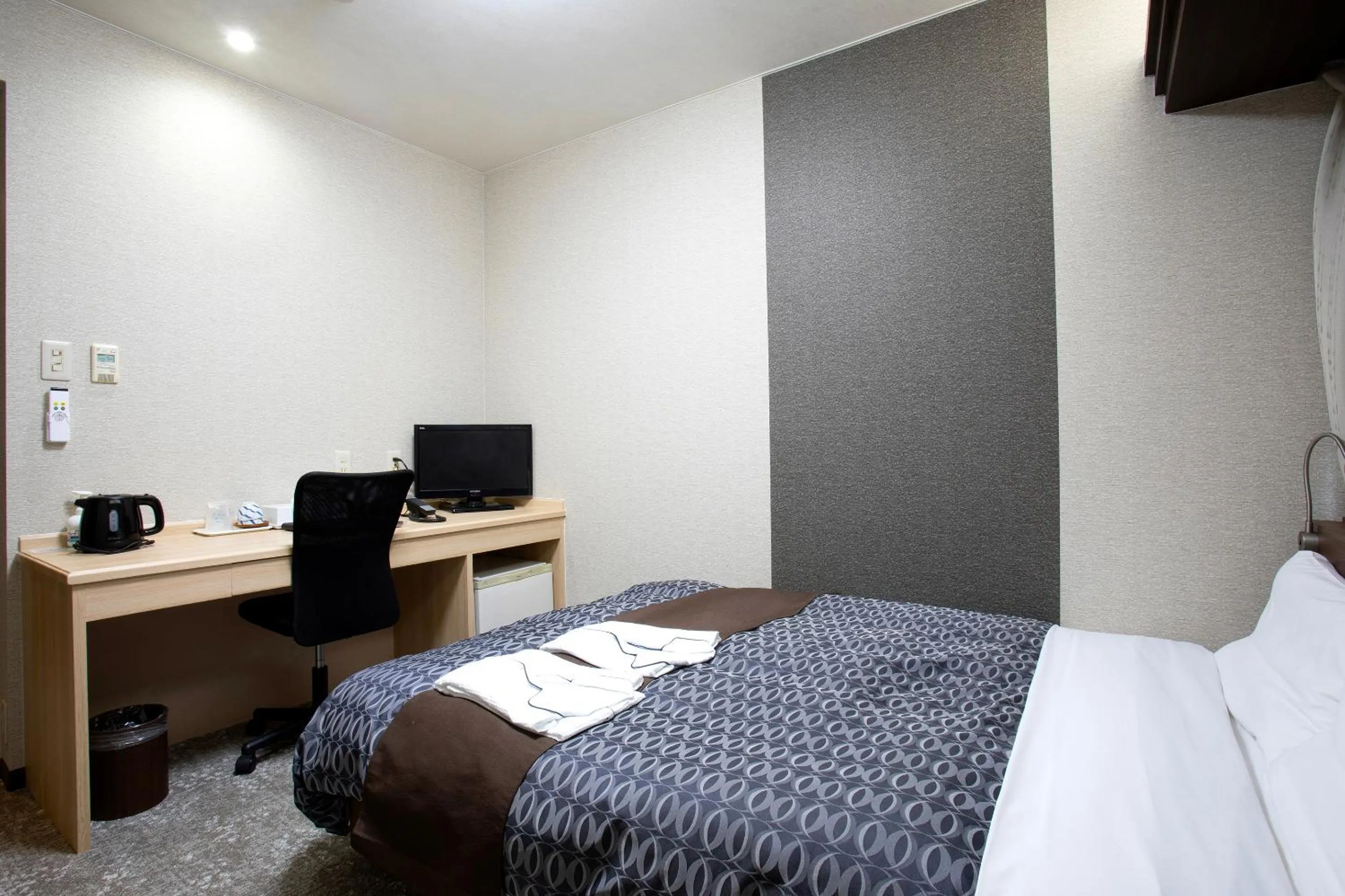 Bed in Nagasaki IK Hotel