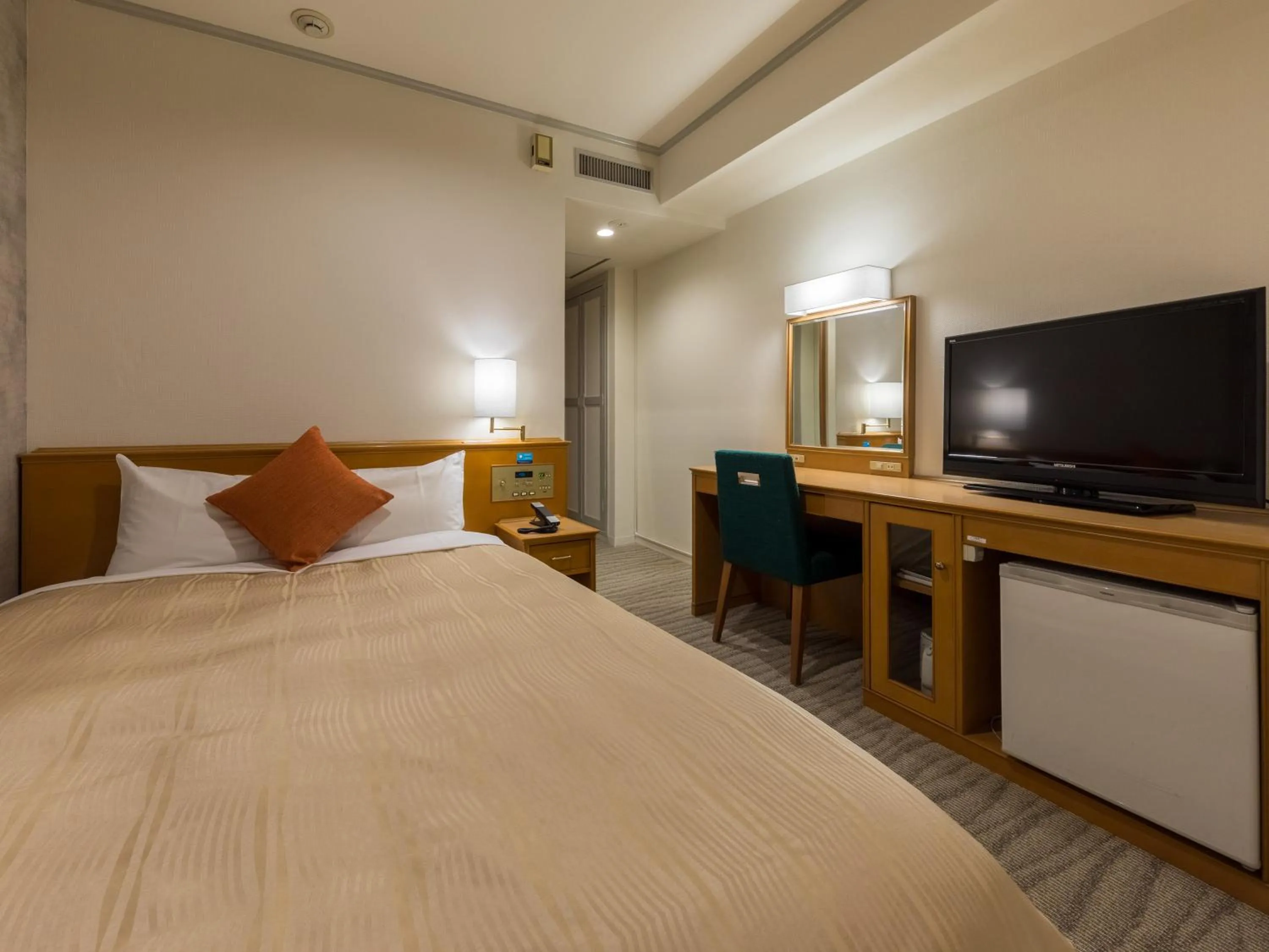 Photo of the whole room, Bed in Nishitetsu Inn Fukuoka