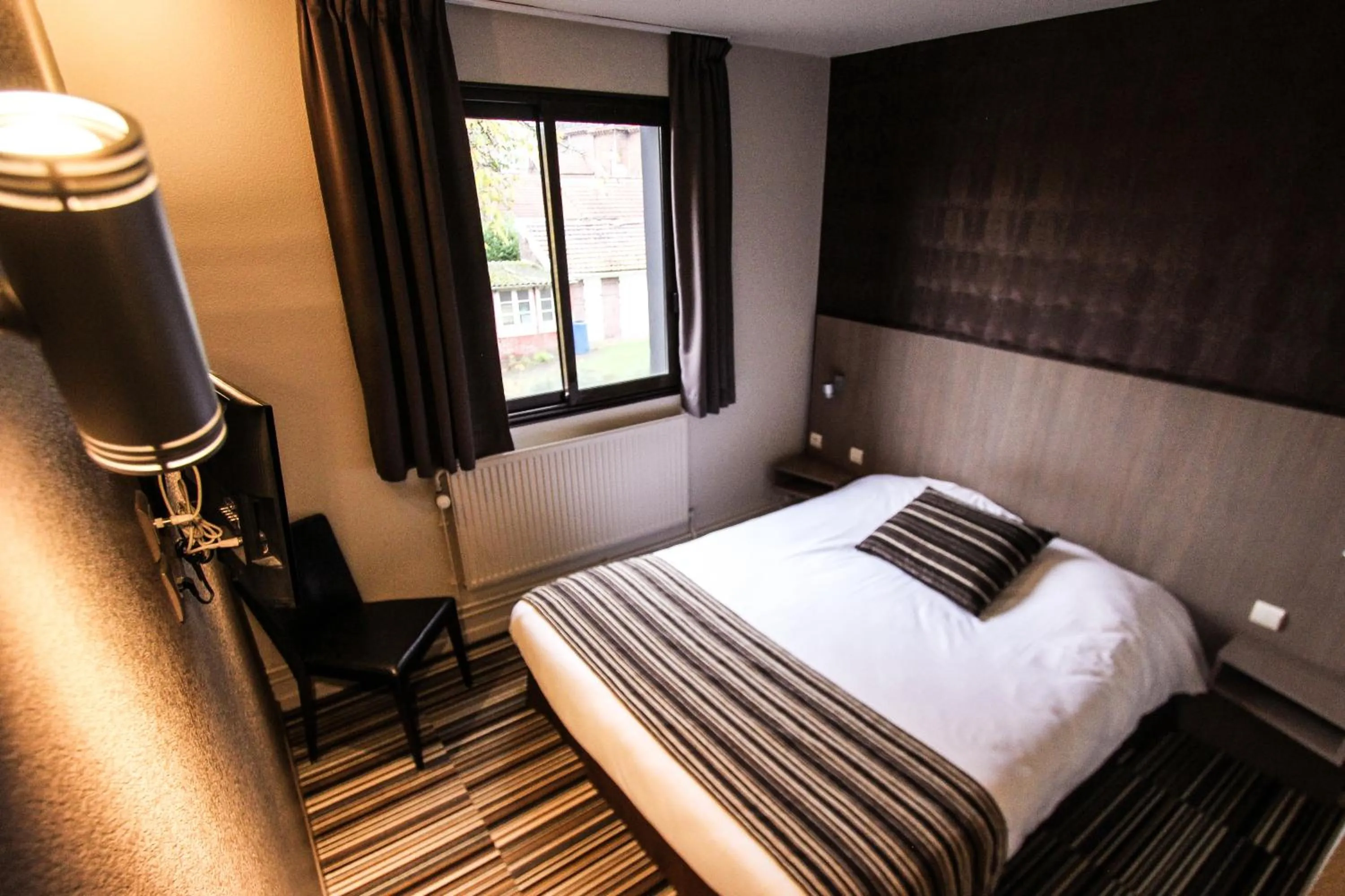 Bedroom in Hotel Bollaert