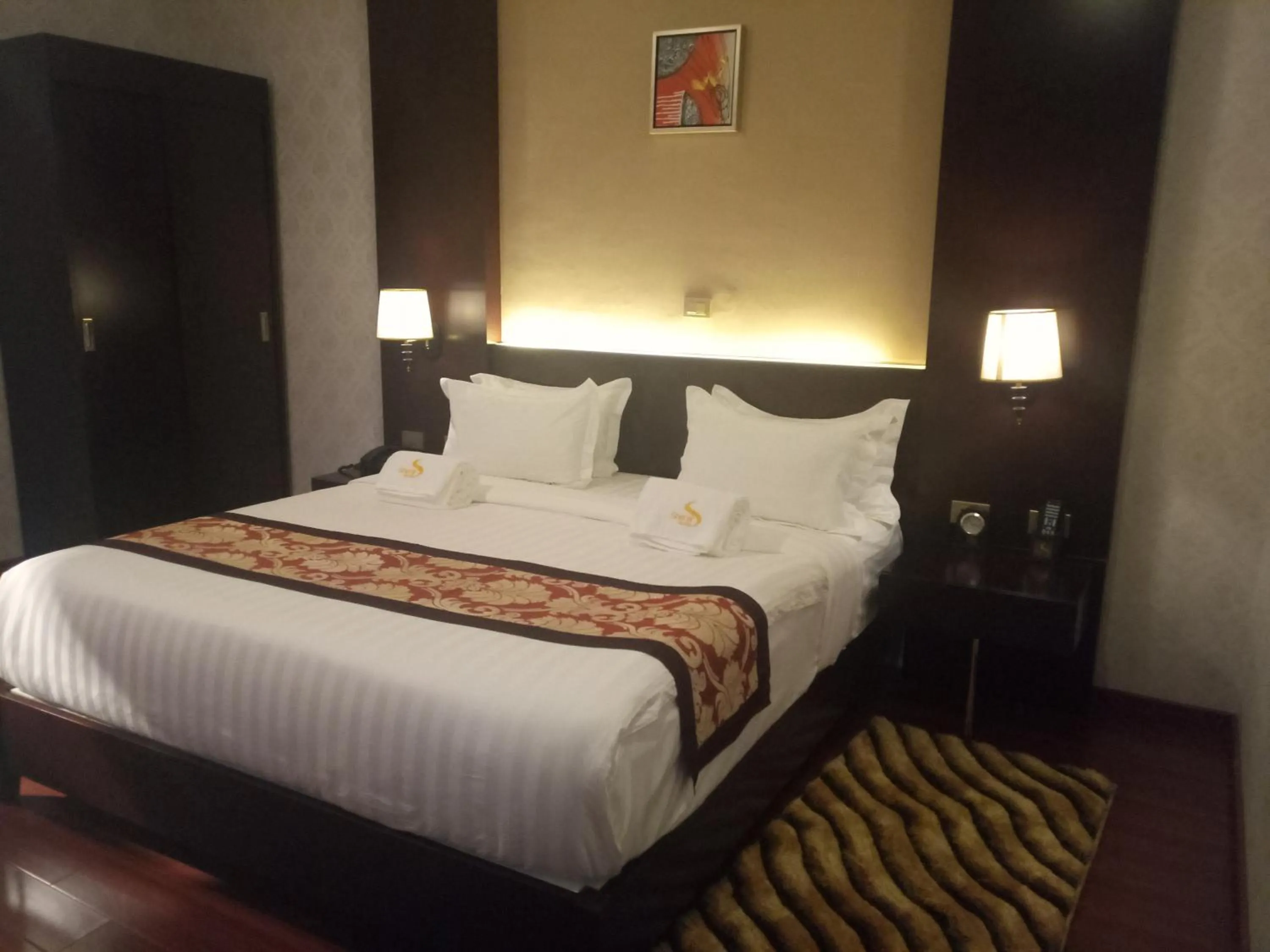 Bed in Sherar Addis Hotel