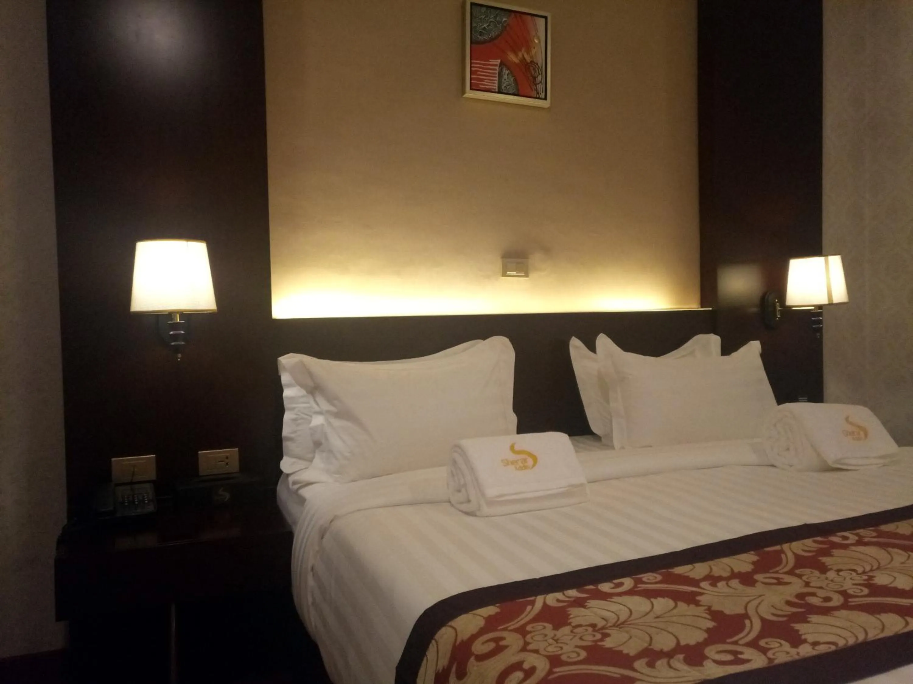 Bed in Sherar Addis Hotel