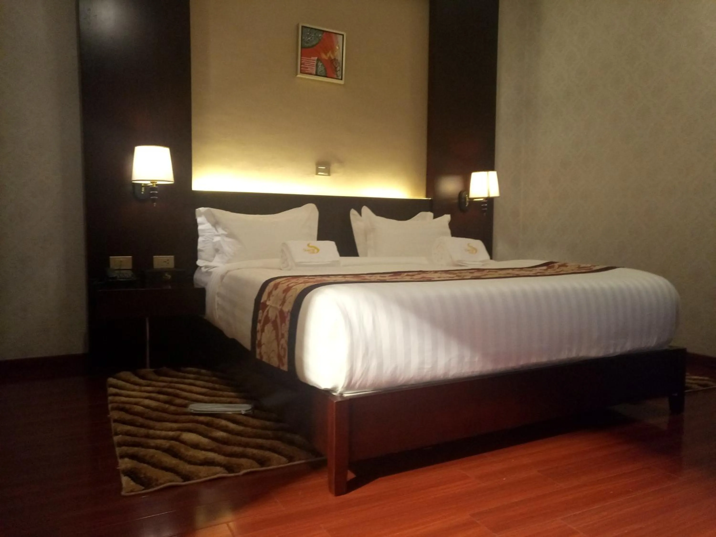 Bed in Sherar Addis Hotel