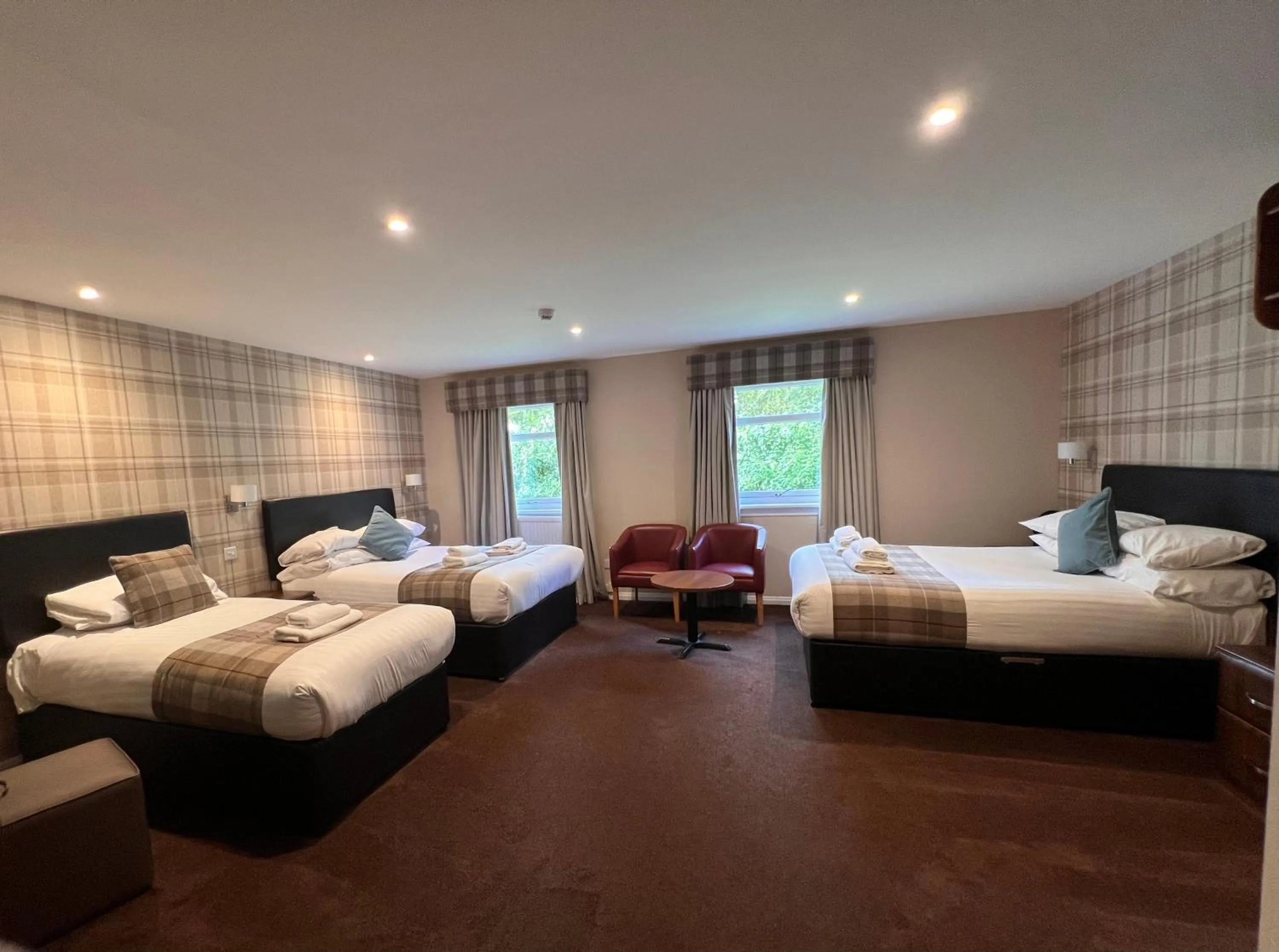 Bed in King Robert Hotel