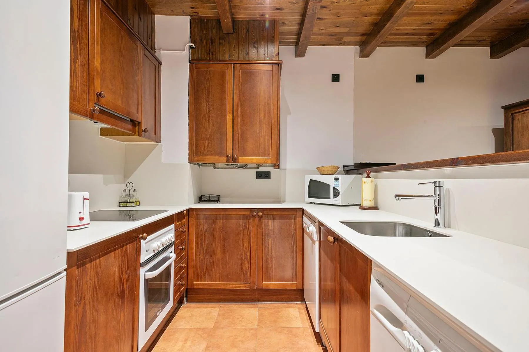 Kitchen or kitchenette in Baqueira Apartamentos Cota 1700 a pie de pistas