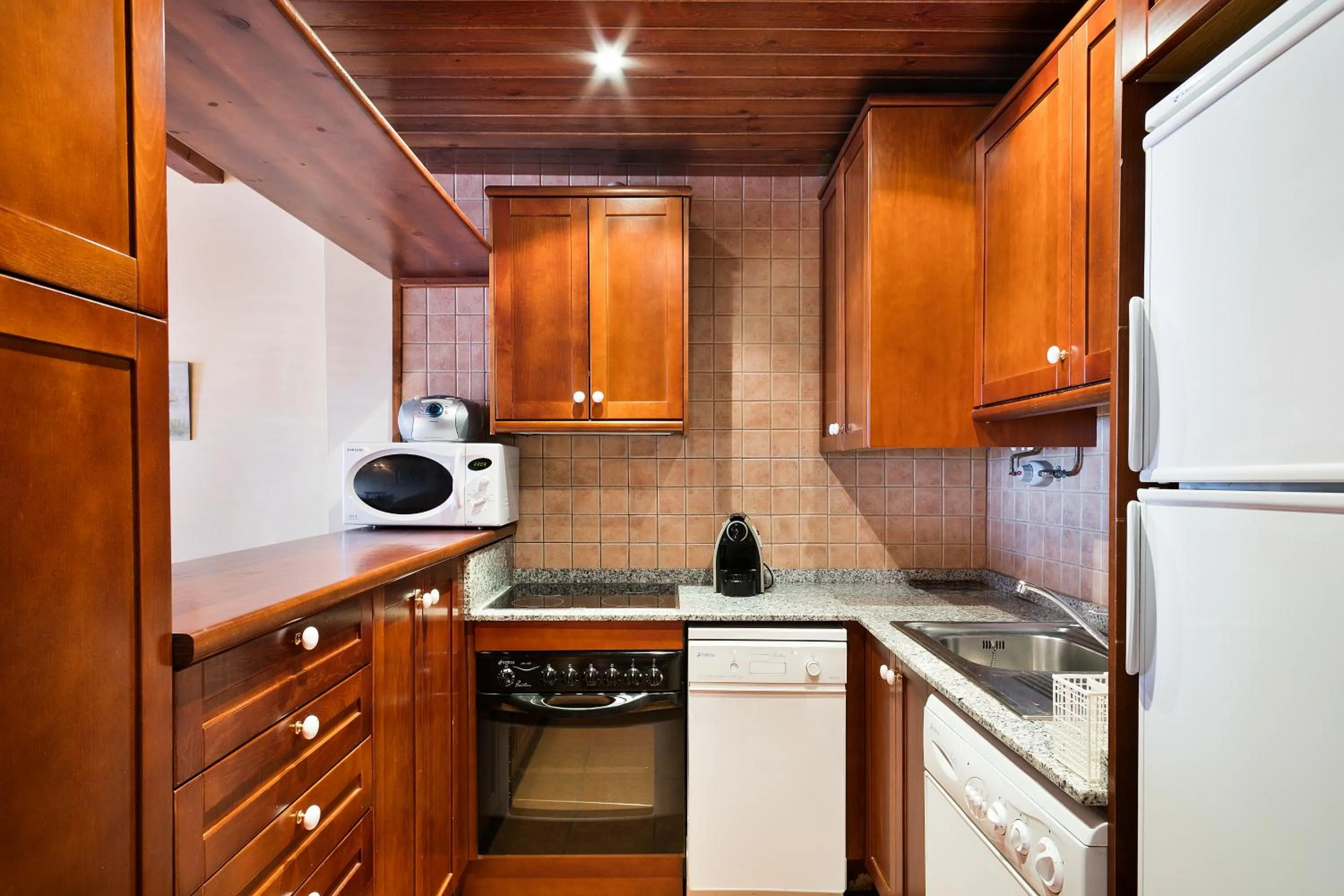 Kitchen or kitchenette in Baqueira Apartamentos Cota 1700 a pie de pistas
