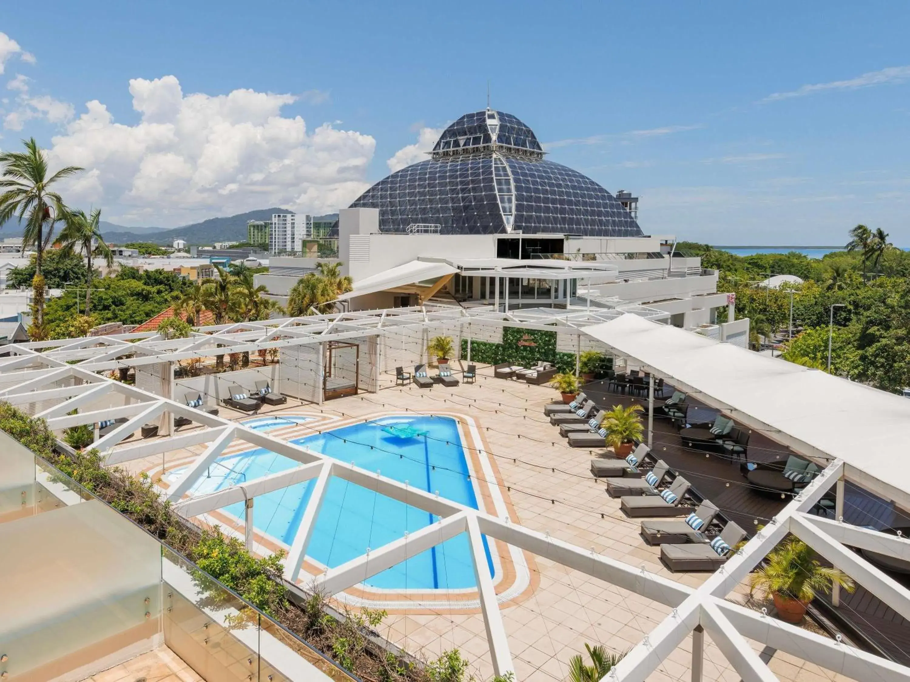 Deluxe Room with 1 King Size Bed and Spa Bath - Pool View with one drink voucher in Pullman Reef Hotel Casino Deluxe Room with 1 King Size Bed and Spa Bath - Pool View with one drink voucher in Pullman Reef Hotel Casino