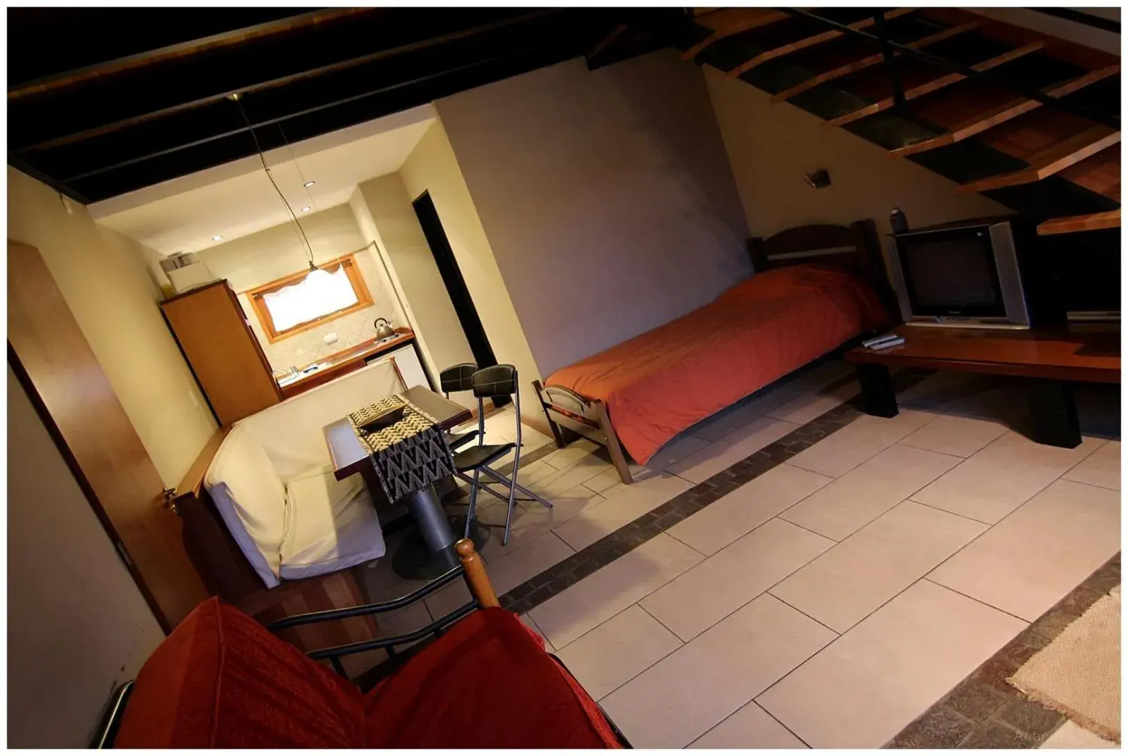 Photo of the whole room in Aires del Beagle Apartment Photo of the whole room in Aires del Beagle Apartment