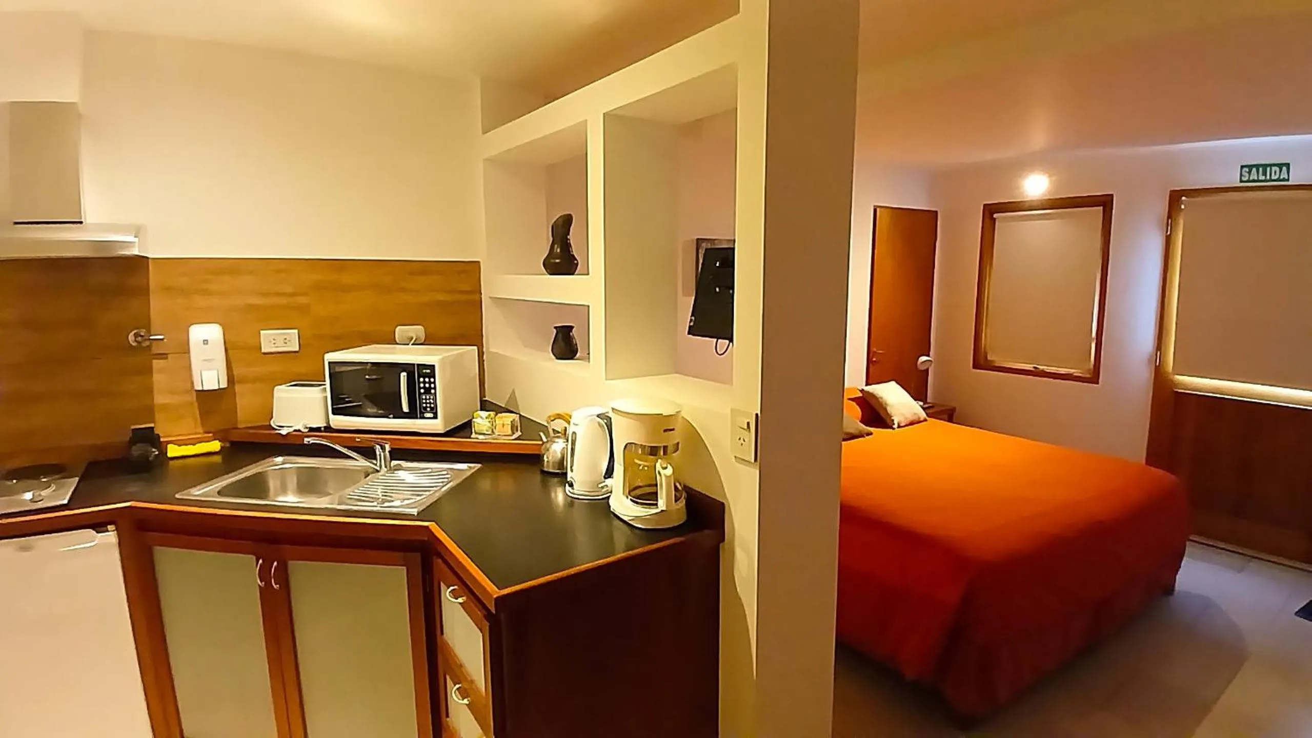 Kitchen or kitchenette, Bed in Aires del Beagle Apartment