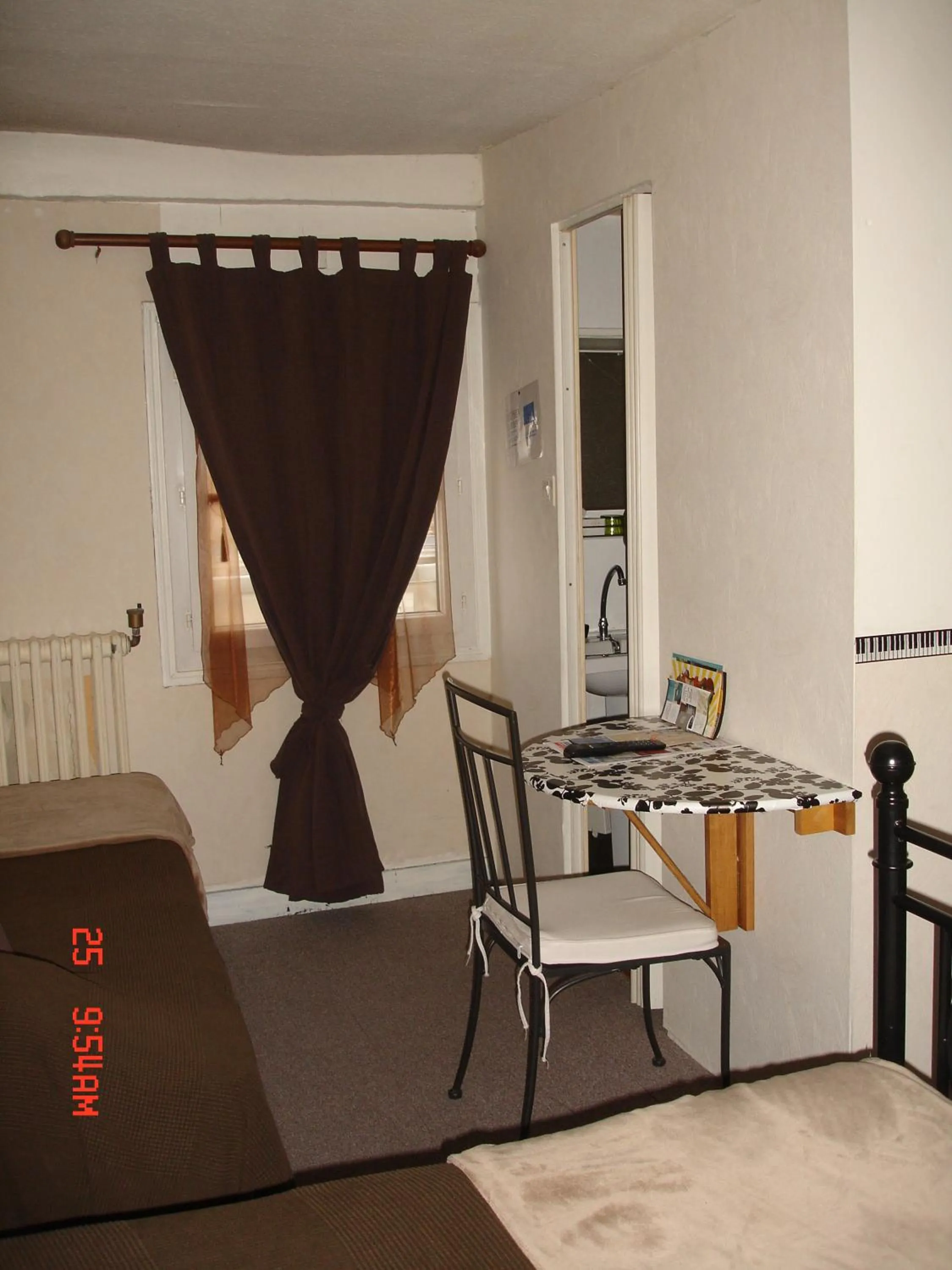 Bedroom in Hôtel de La Marmotte