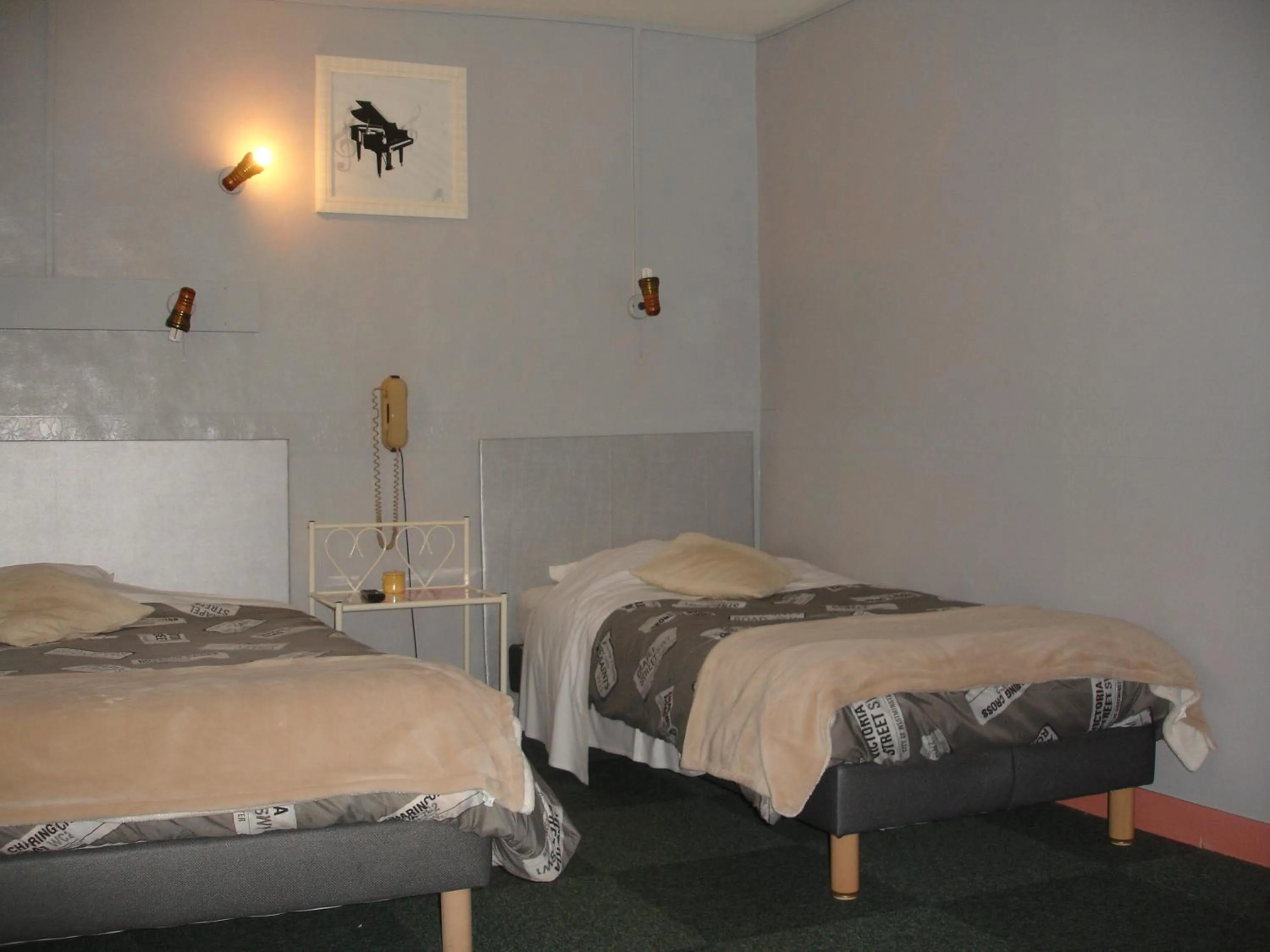 Bedroom, Bed in Hôtel de La Marmotte