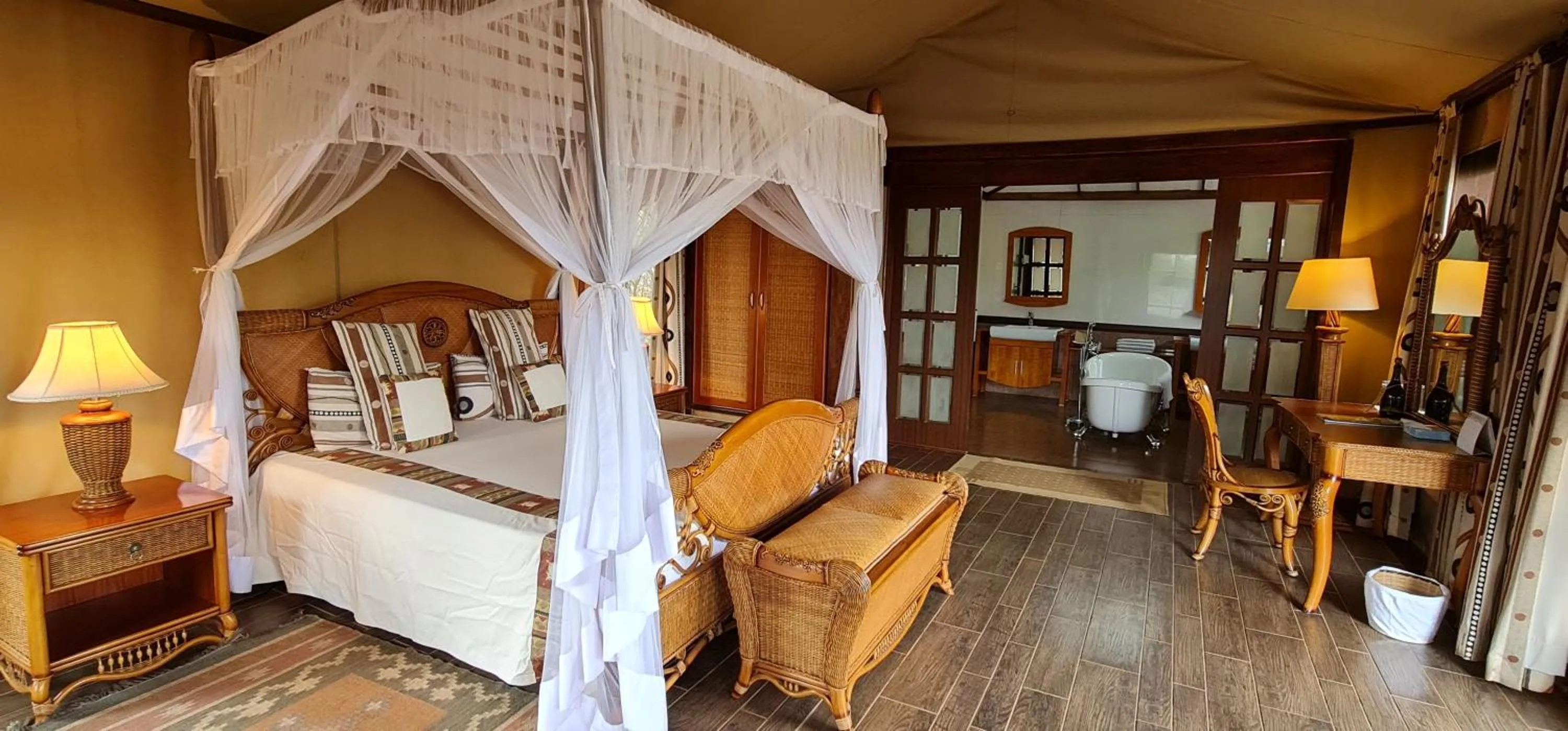 Bed in Kilima Safari Camp