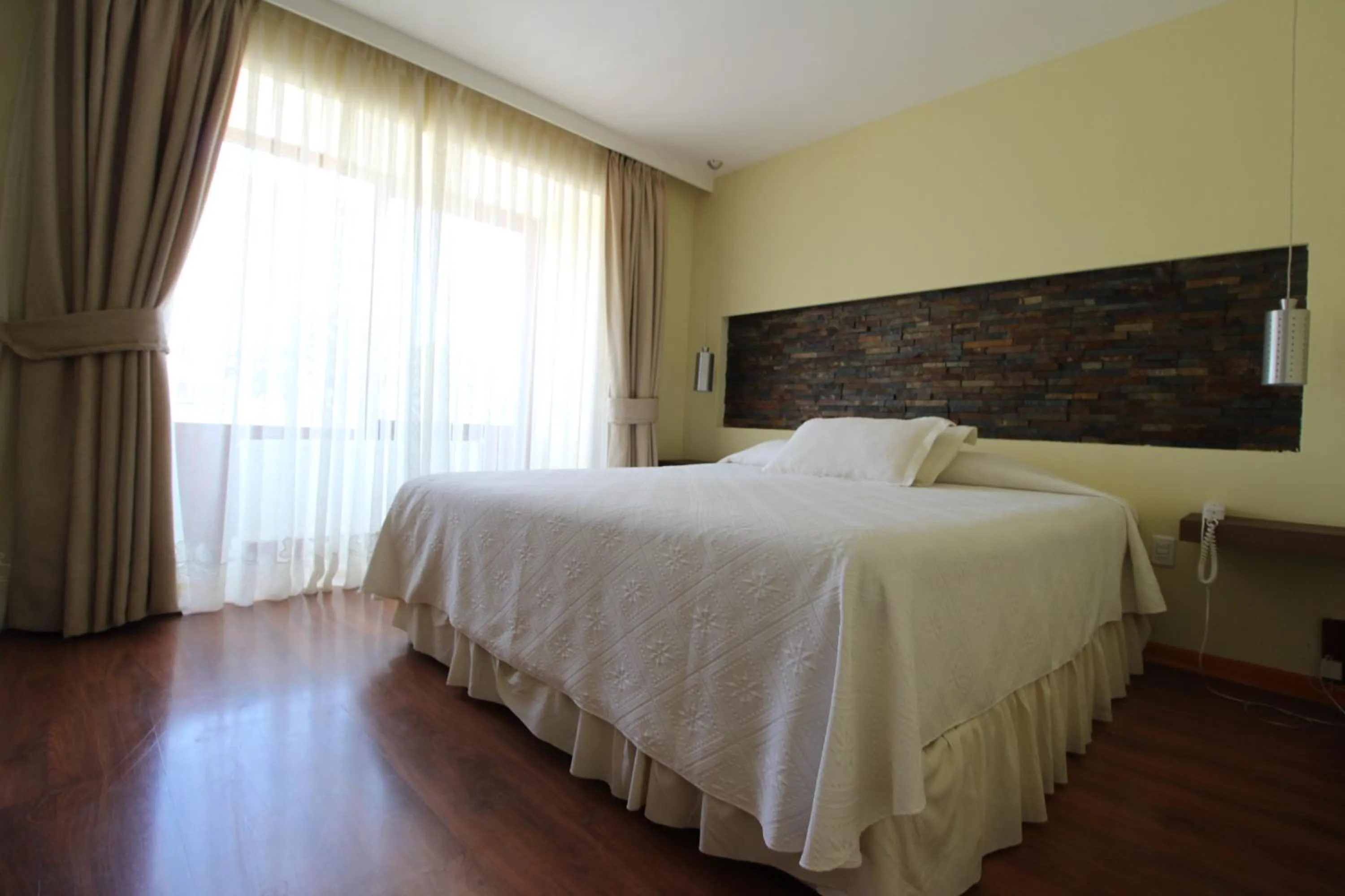 Bed in Hotel La Serena Plaza