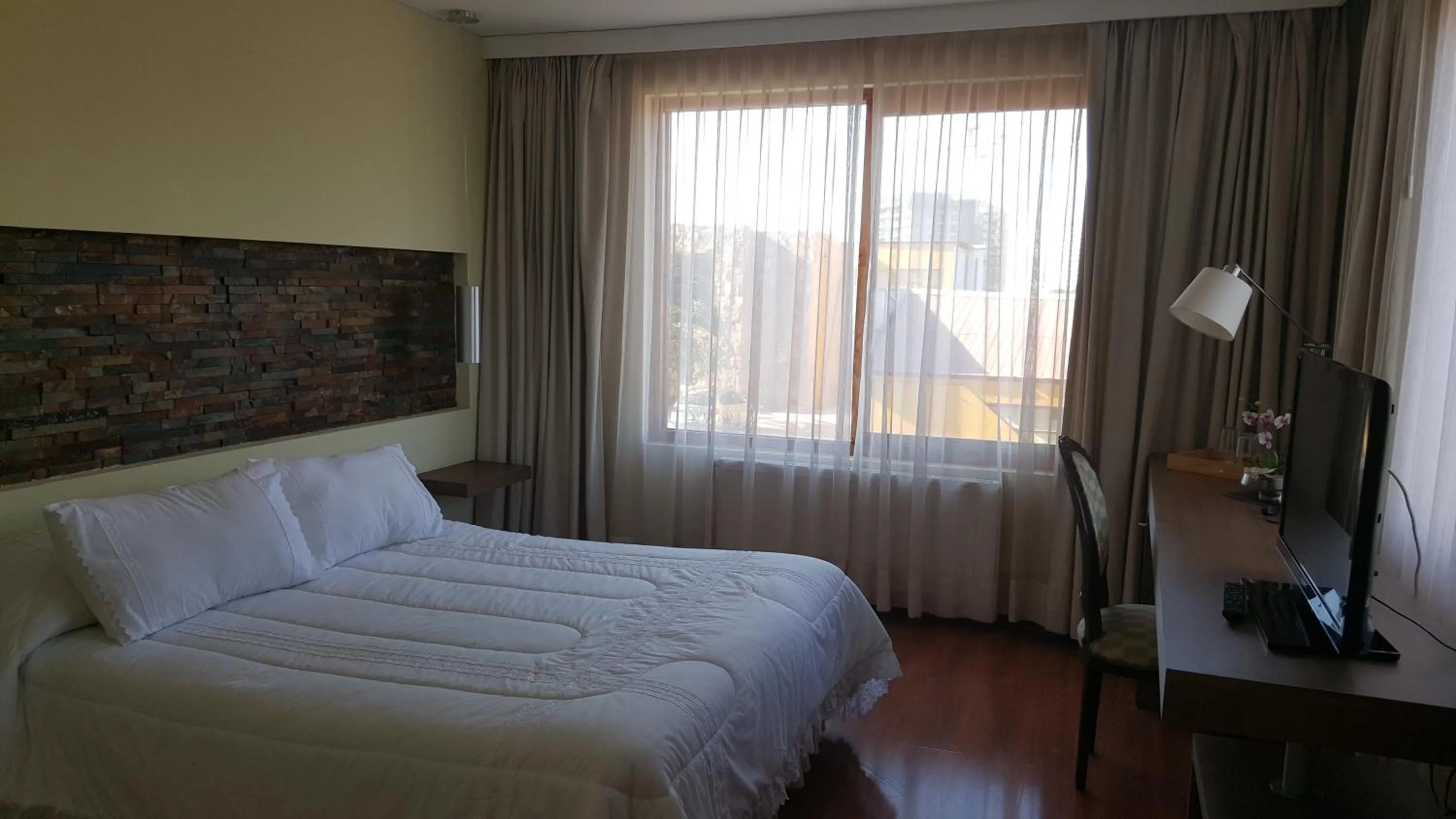 Photo of the whole room, Bed in Hotel La Serena Plaza