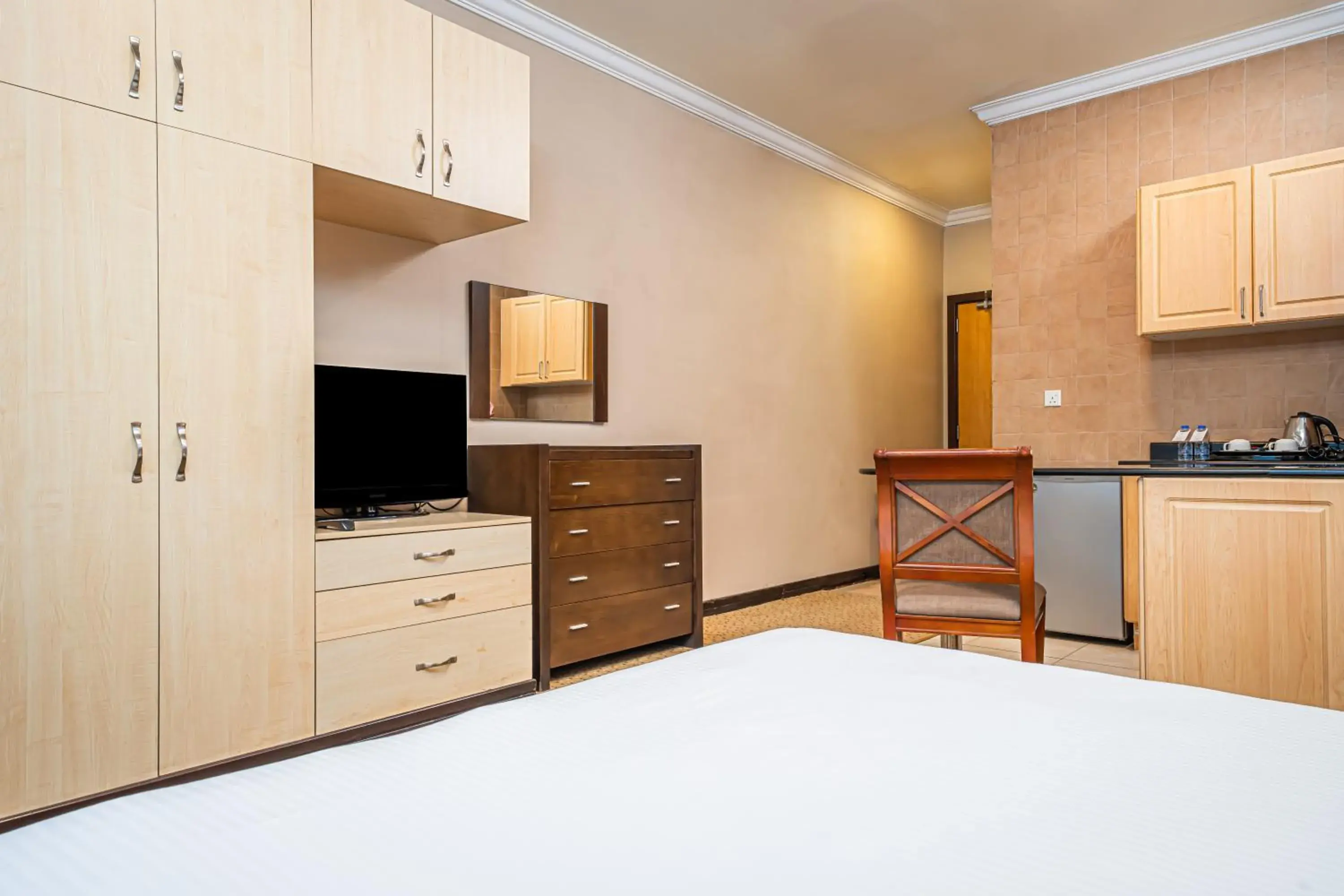 Bedroom in Kingsgate Hotel Doha by Millennium Hotels Bedroom in Kingsgate Hotel Doha by Millennium Hotels