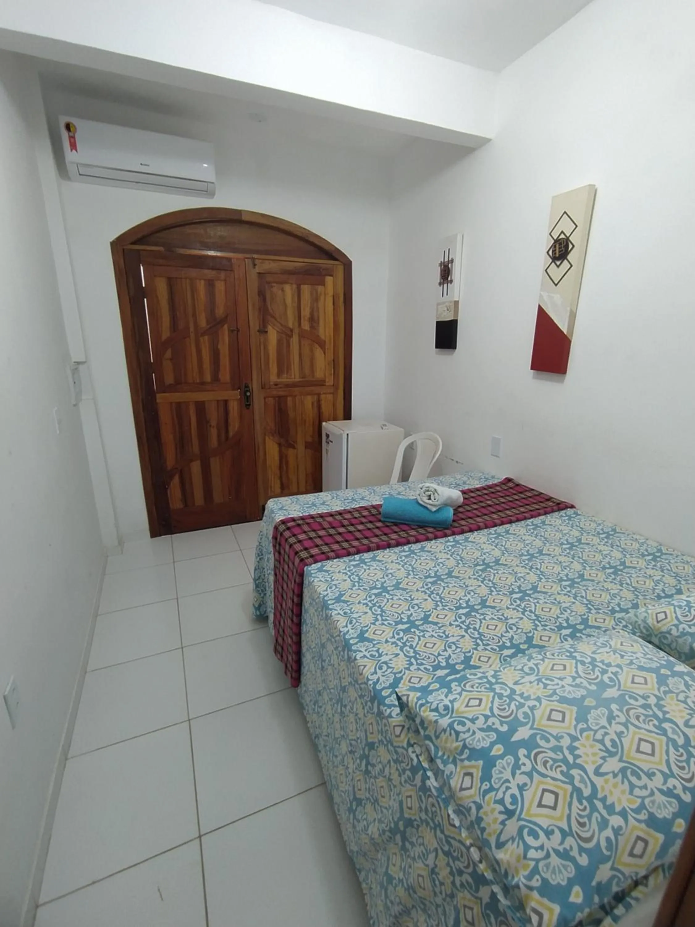 Bed in Pousada Luzena