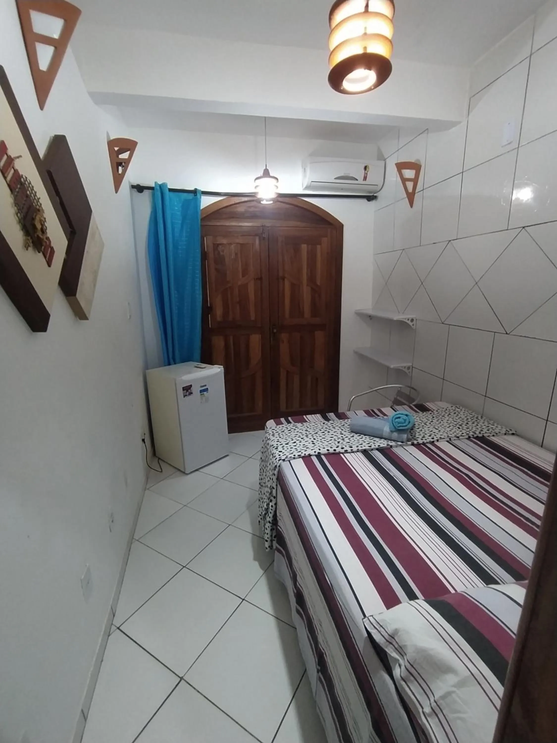 Bed in Pousada Luzena