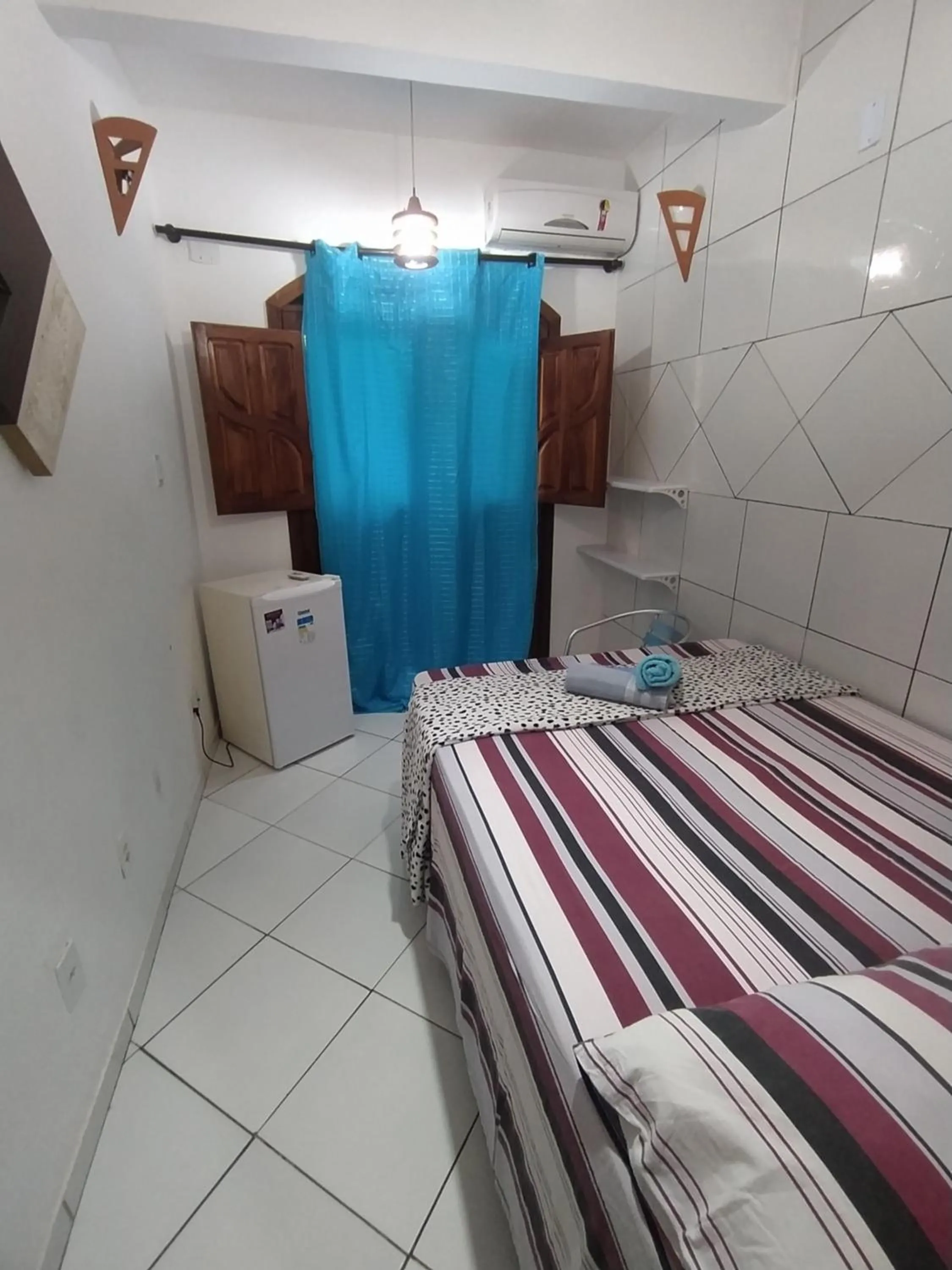 Bed in Pousada Luzena
