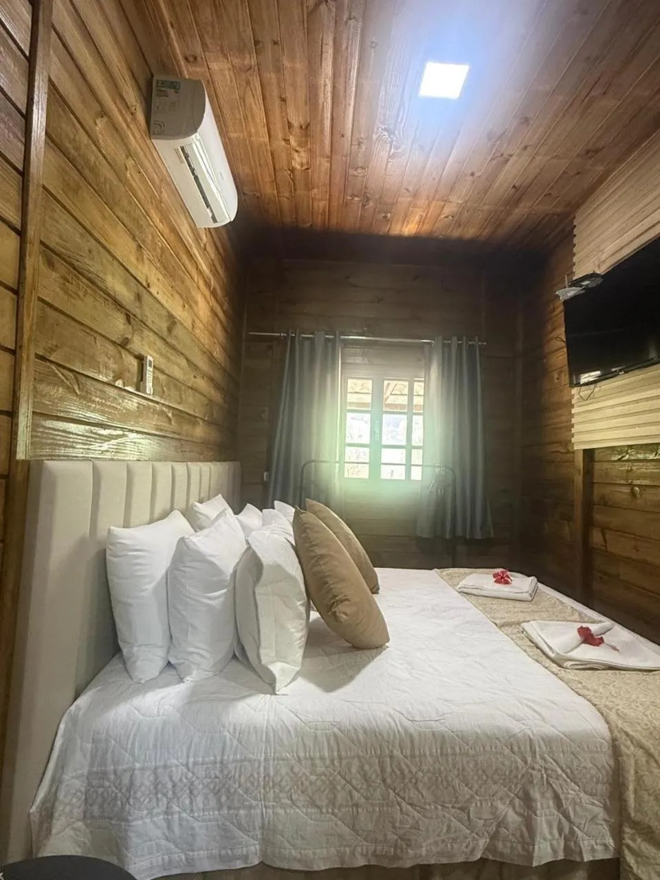 Bed in Pousada Dona Carmita