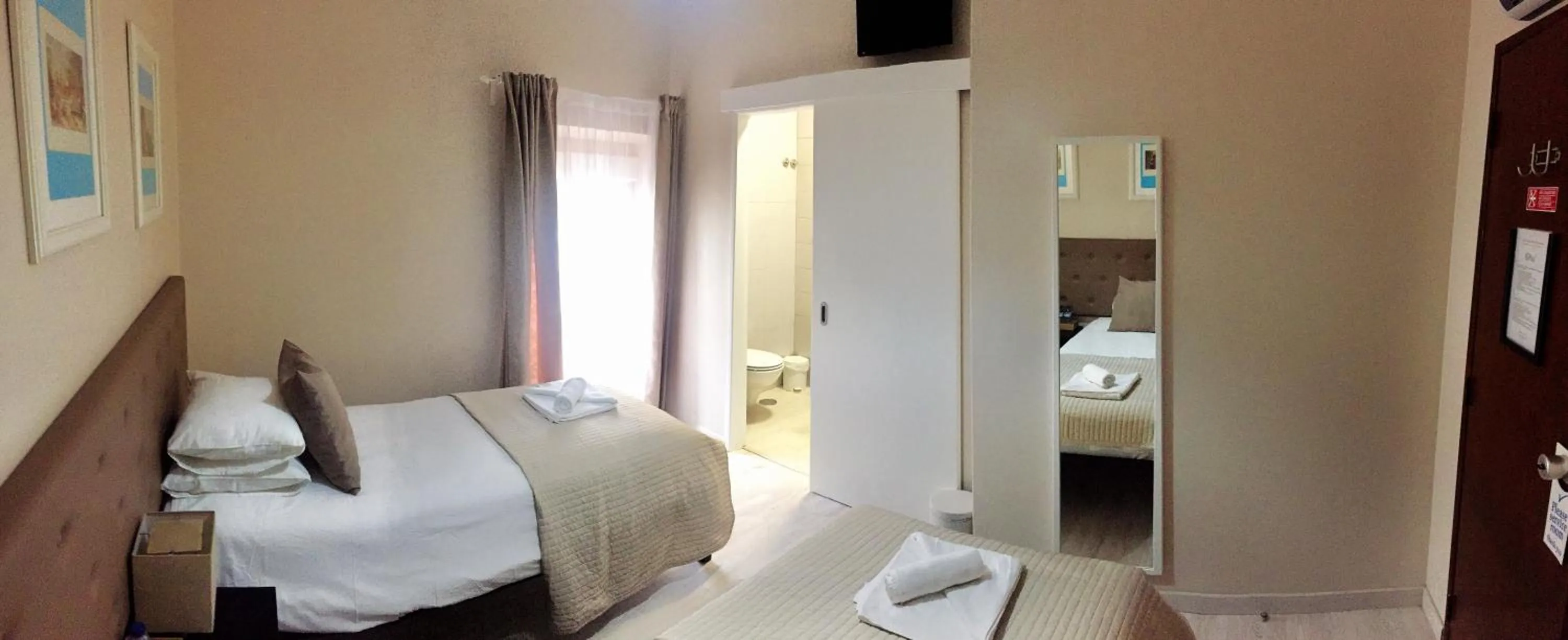 Photo of the whole room, Bed in The Capital Boutique B&B