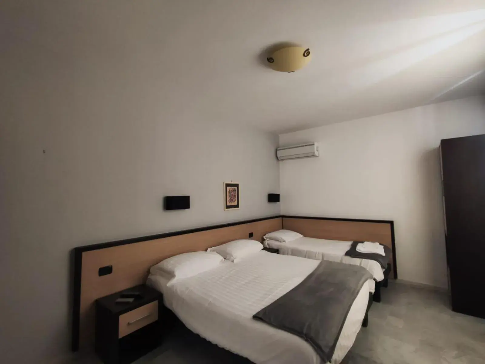 Triple Room in Hotel Quadrifoglio Triple Room in Hotel Quadrifoglio