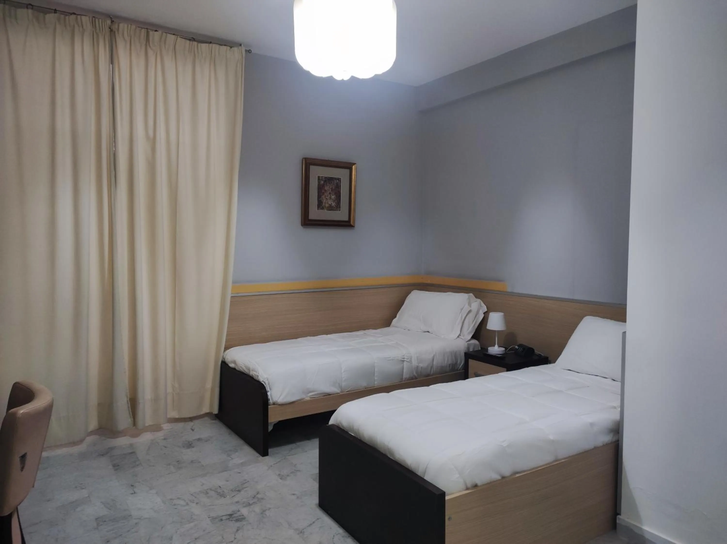Bed in Hotel Quadrifoglio