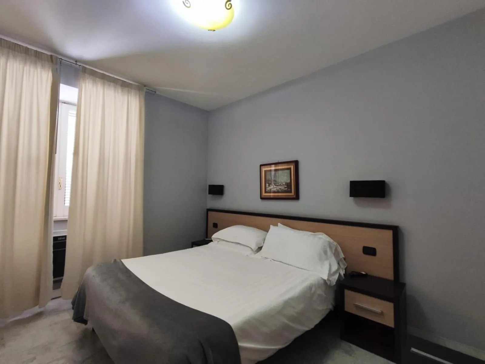 Bed in Hotel Quadrifoglio